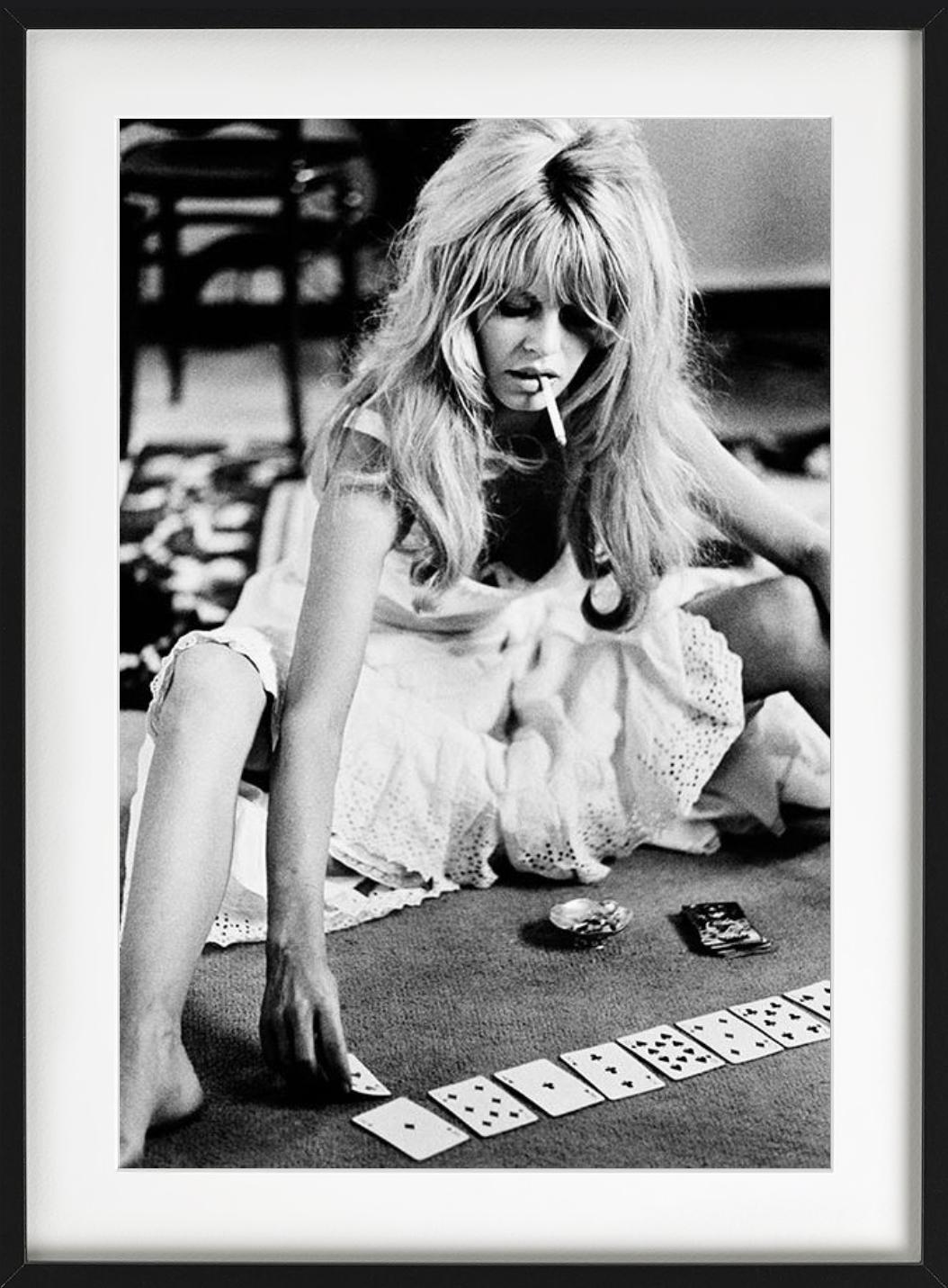 Brigitte Bardot playing cards, Fine Art Photography, 1965 - Gray Portrait Photograph by Douglas Kirkland