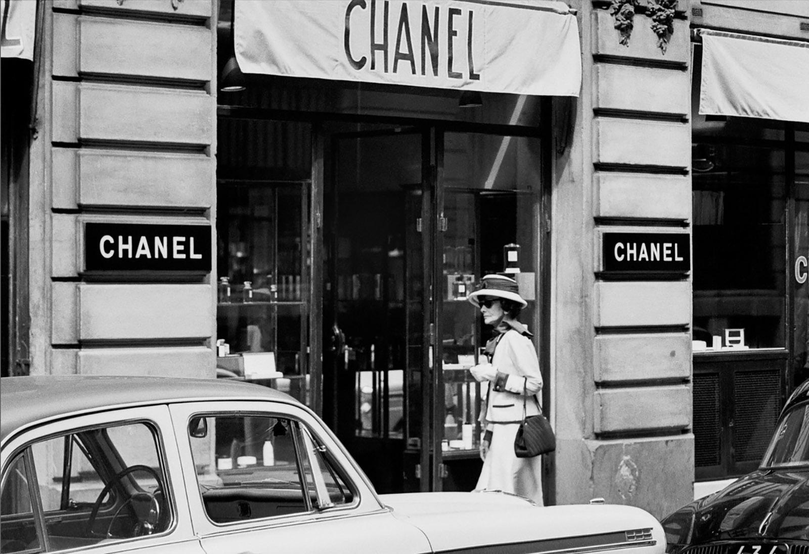 Douglas Kirkland Portrait Photograph - Coco Chanel, Enters Atelier at 31 Rue Cambon Paris 1962