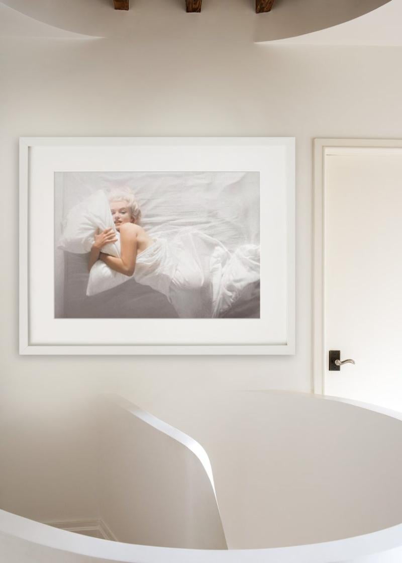 Marilyn Monroe I - rolling between white sheets, fine art photography, 1961 - Photograph by Douglas Kirkland