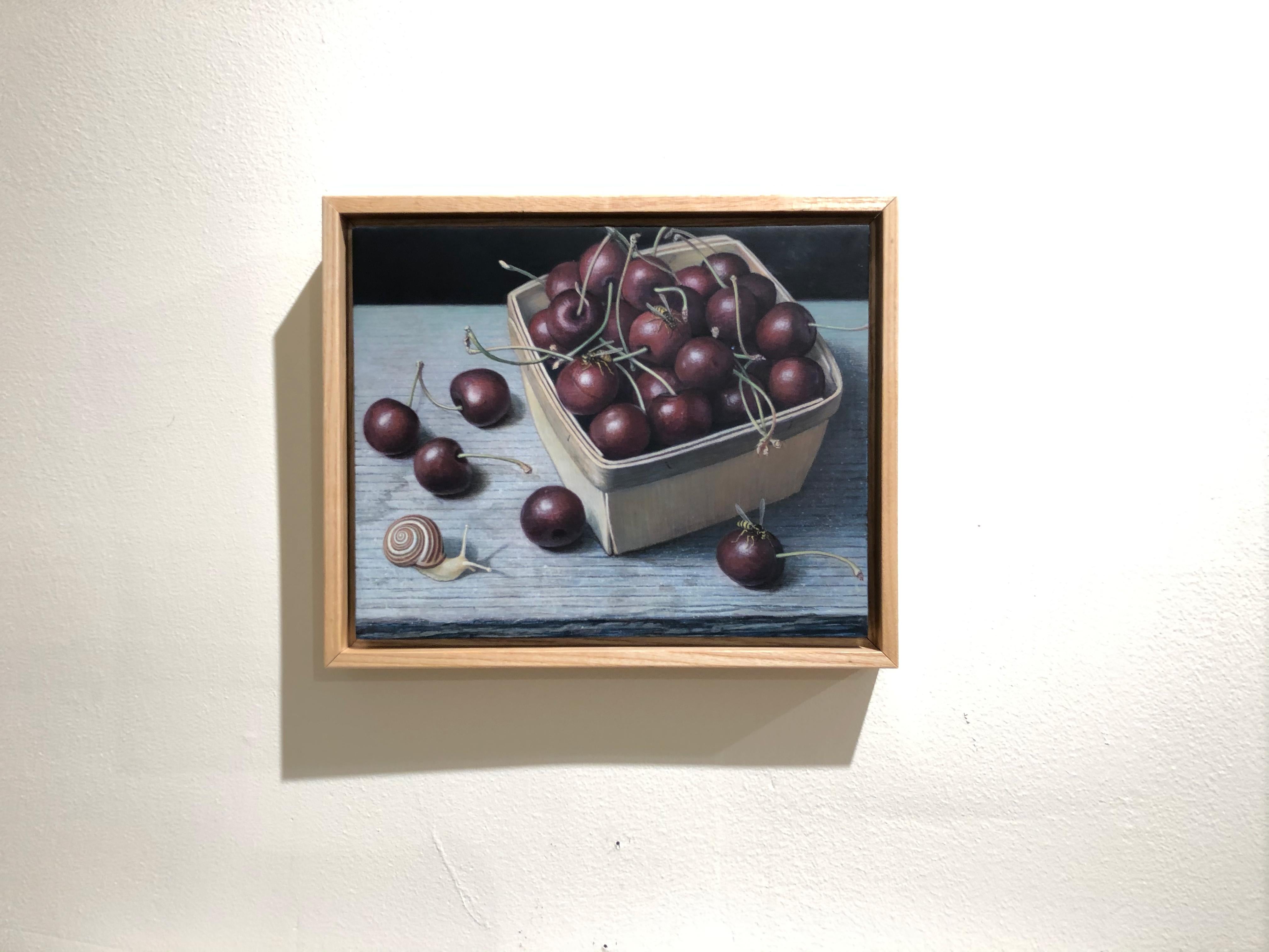 Bing Cherries in a Pint Basket, surreal egg tempera still life painting, 2020 - Surrealist Painting by Douglas Safranek