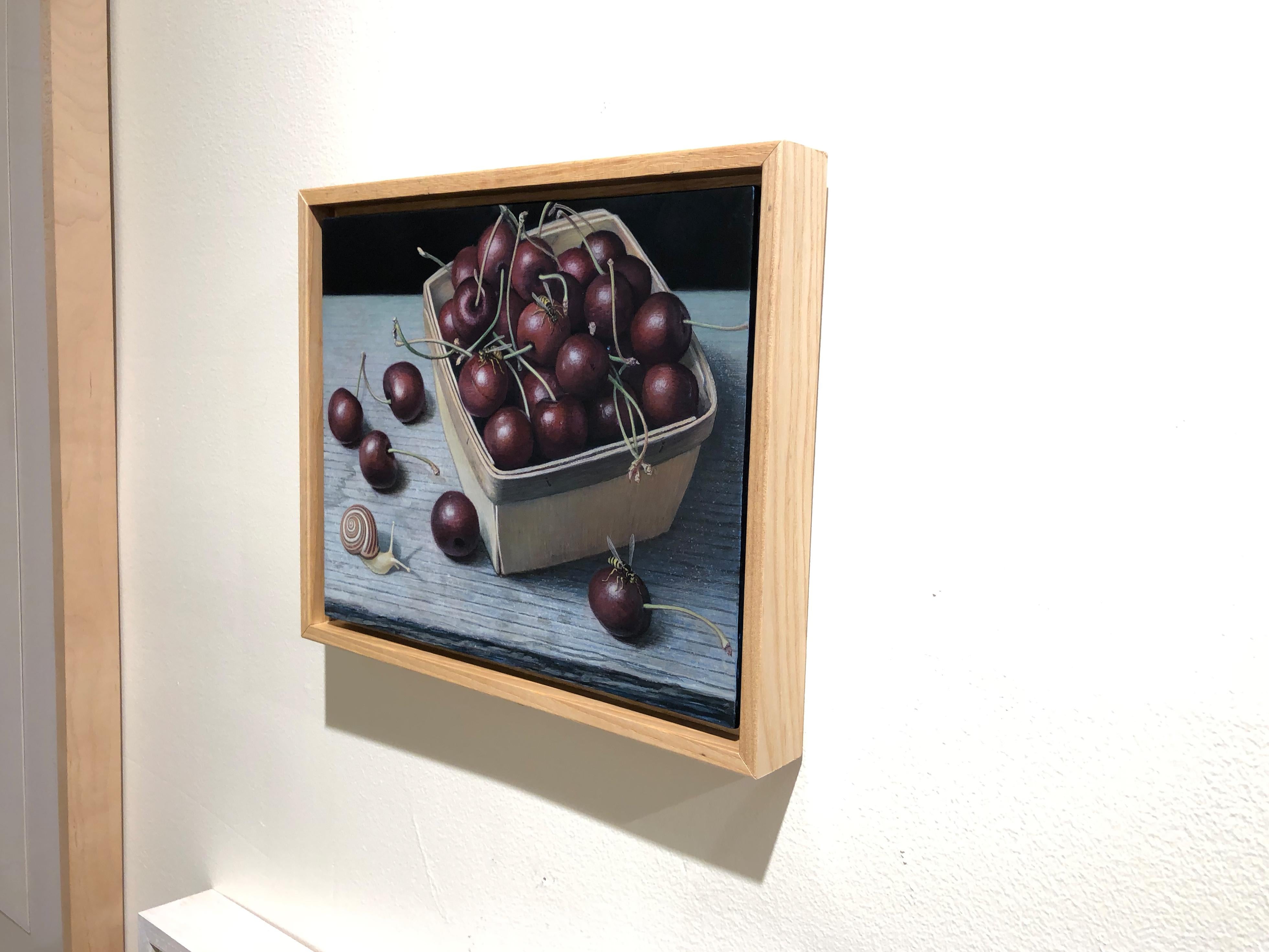 Bing Cherries in a Pint Basket, surreal egg tempera still life painting, 2020 - Black Animal Painting by Douglas Safranek
