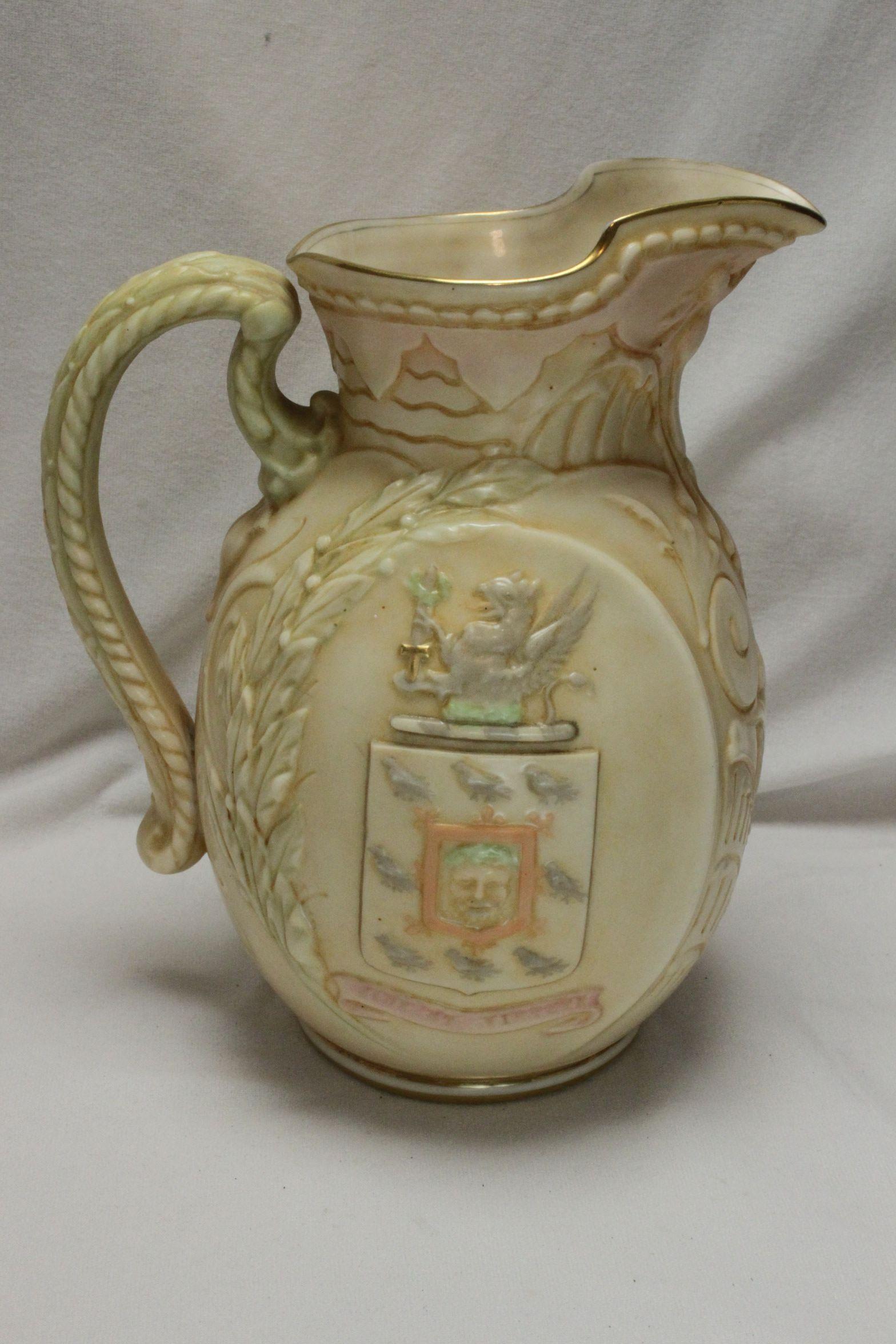 This Doulton Burslem jug was issued in 1898 to commemorate the death of William Ewart Gladstone (1809-1898). Gladstone was an English politician who served as Prime Minister on four occasions. Made of parian, a type of porcelain, and given a vellum