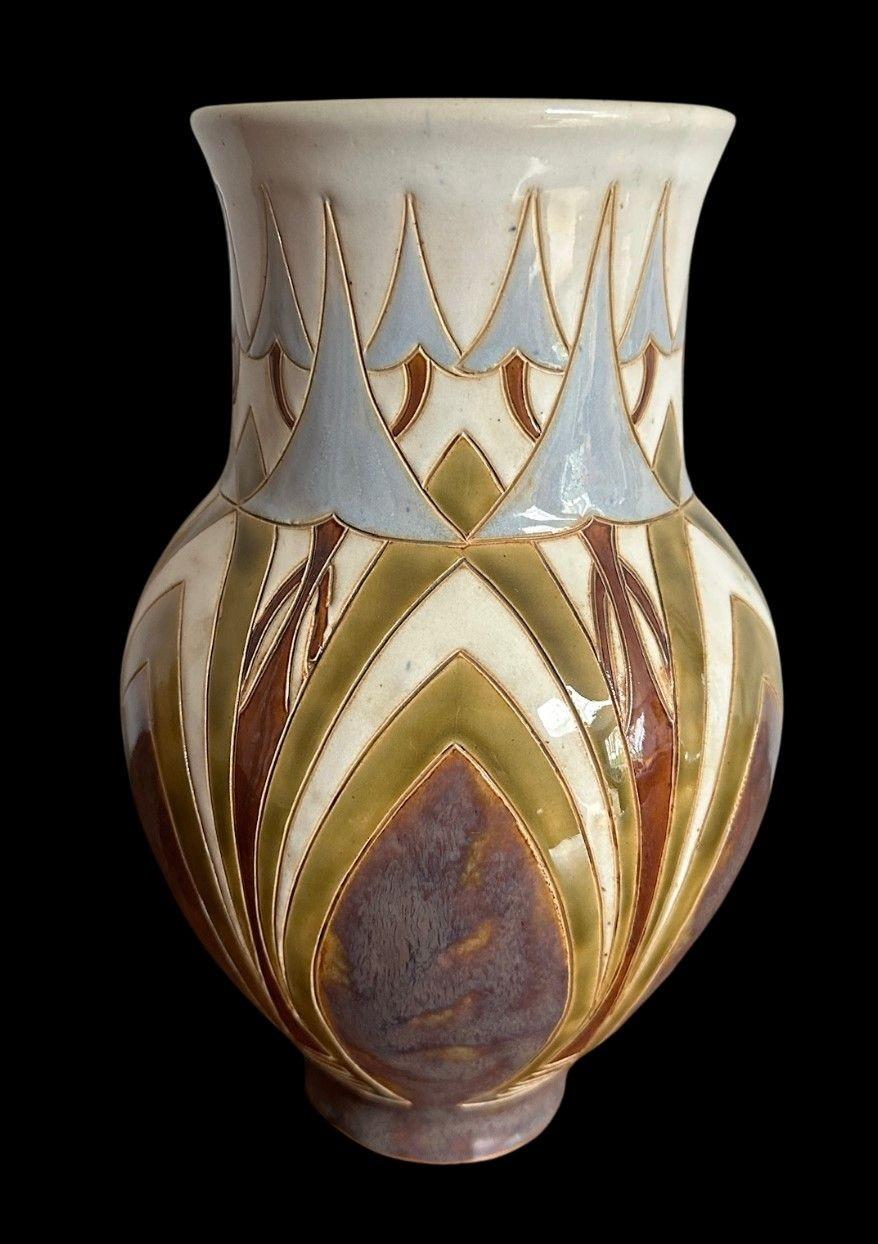5528 Doulton Lambeth Vase decorated in a strong Art Nouveau Design by Eliza Simmance and Bessie Newbury
Ex Harriman Judd Collection
Circa 1890
27cm high, 15cm wide