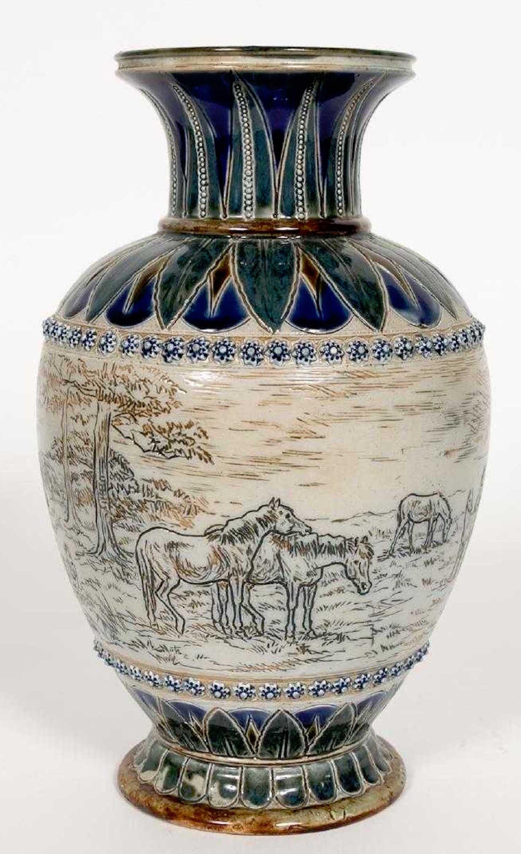 Doulton Lambeth equestrian Vase by Hannah Barlow (1851-1916) Incised decoration with thirteen horses in landscape, with applied and enameled decoration. Signed and dated 1876.