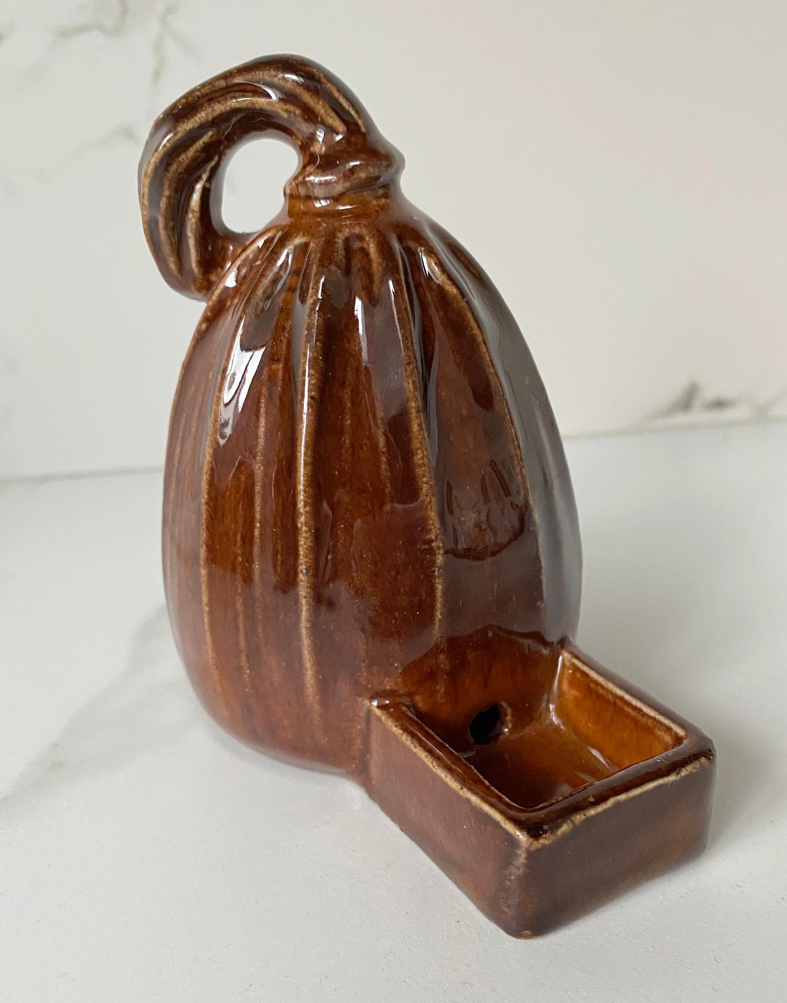 Rare stoneware pumpkin shape brown glazed ‘isobath’ birds drinking water holder by Doulton Lambeth and with date marks for 1923. This unusual piece is very much in the Arts & Crafts style and comprises of a pumkin shaped hollow vessel with a with a