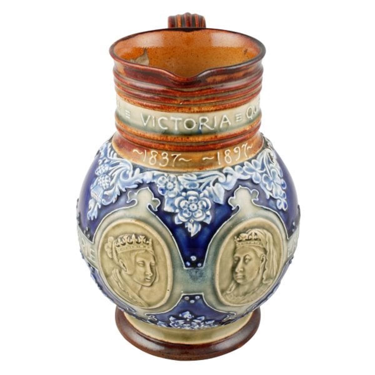 A stunning late 19th century Victorian Doulton Lambeth pottery jug commemorating Queen Victoria's 60th year on the throne.

The jug is decorated with a cameo of the young and old Victoria and has written around the jug 