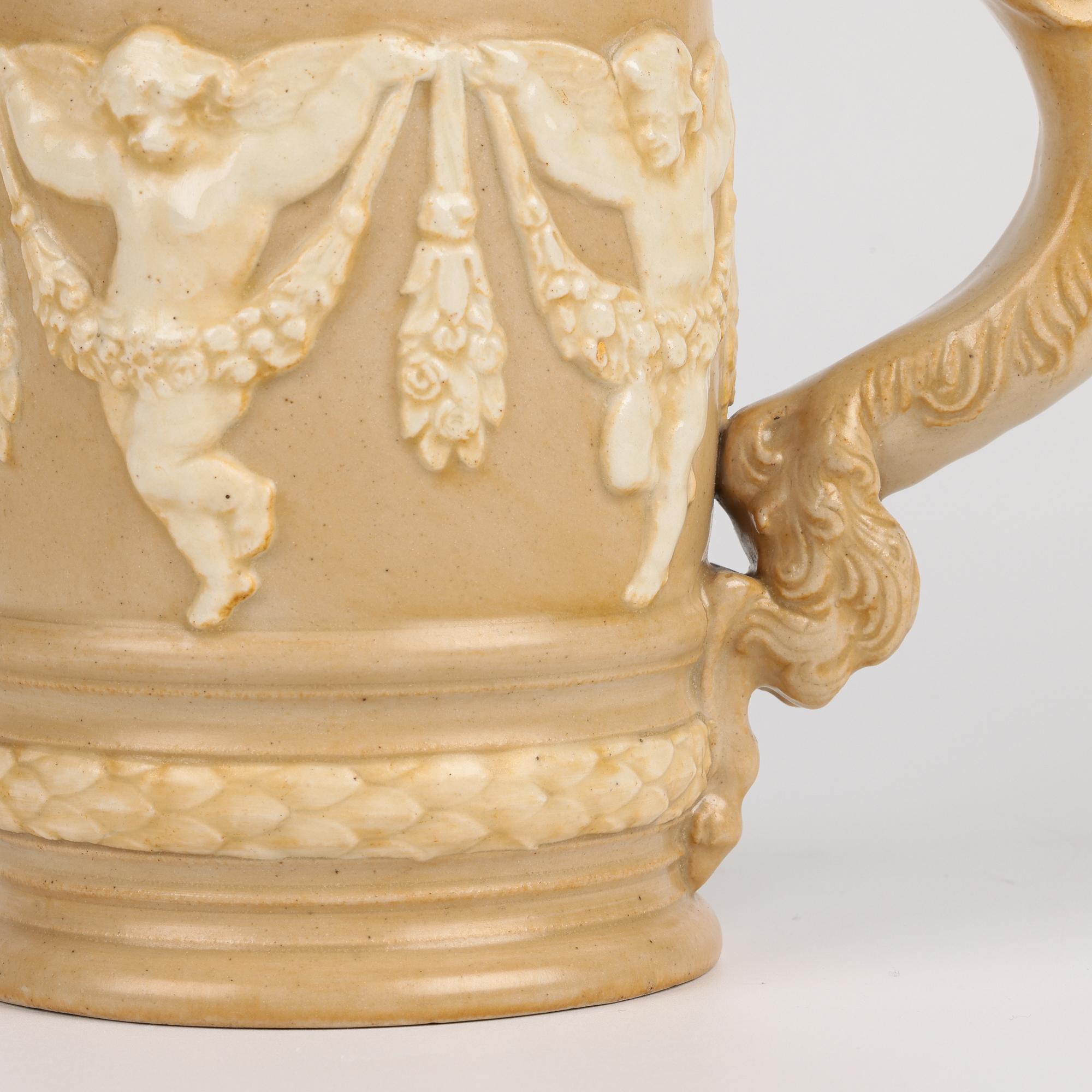 Jarra de gres con asa de sátiro alado Doulton Lambeth Inglés en venta