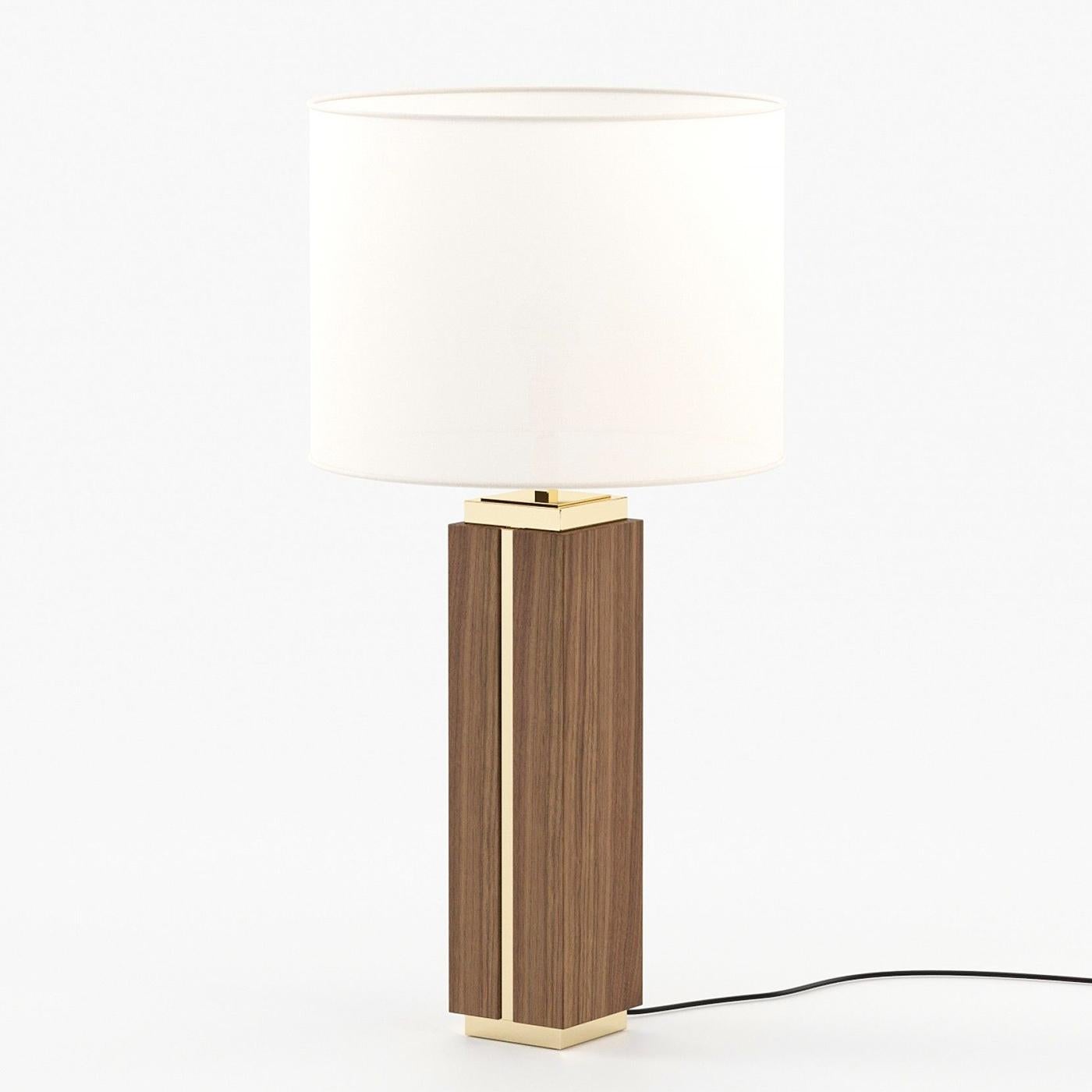 Table Lamp Dounia Walnut with walnut wood and
polished stainless steel base in, stainless steel in 
gold finish, including a white lamp shade.
1 Bulb, lamp holder type E27, max 40 watt, bulb not
included. Also available with other wood finish,