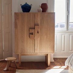 solid oak wood Douro Cabinet on legs with gauged textured abstract handles