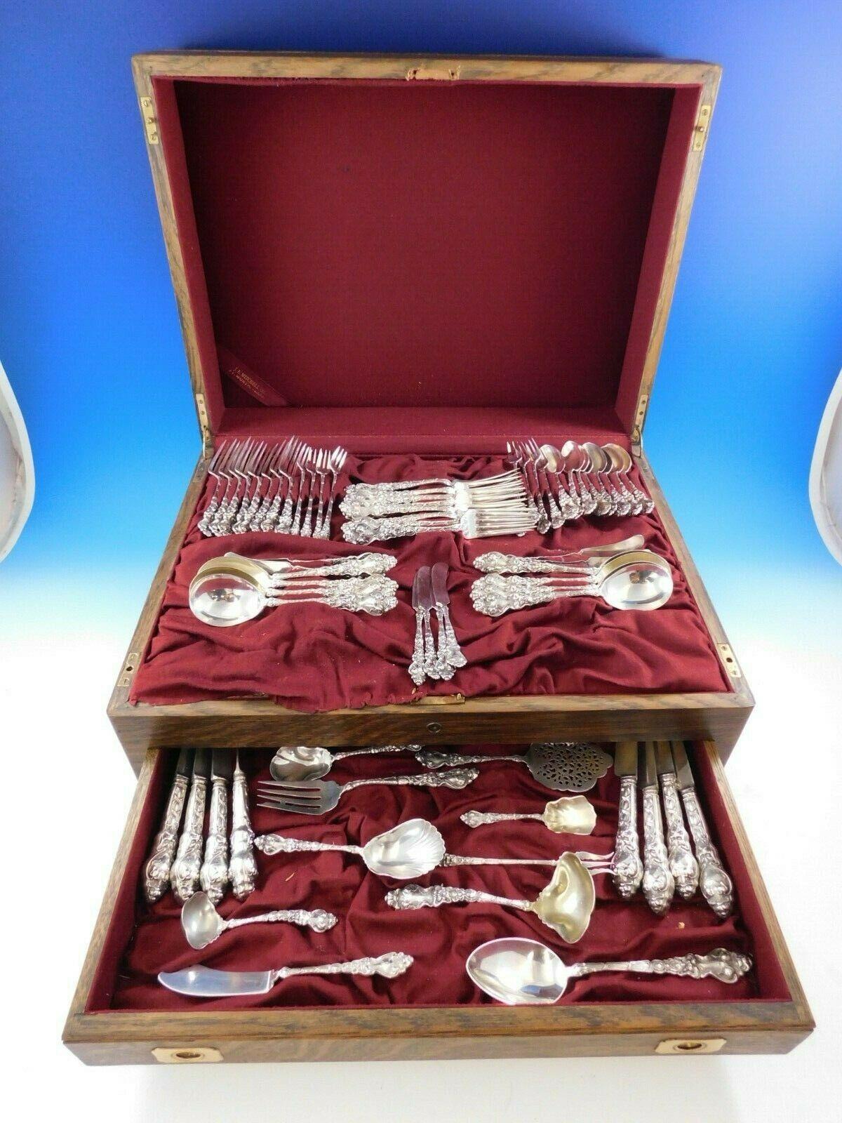 Exceptional Figural Art Nouveau Douvaine by Unger sterling silver flatware dinner size set - 68 pieces. This pattern features a stylized dolphin and the face of the north wind. This set includes:

8 dinner knives, 9 1/2