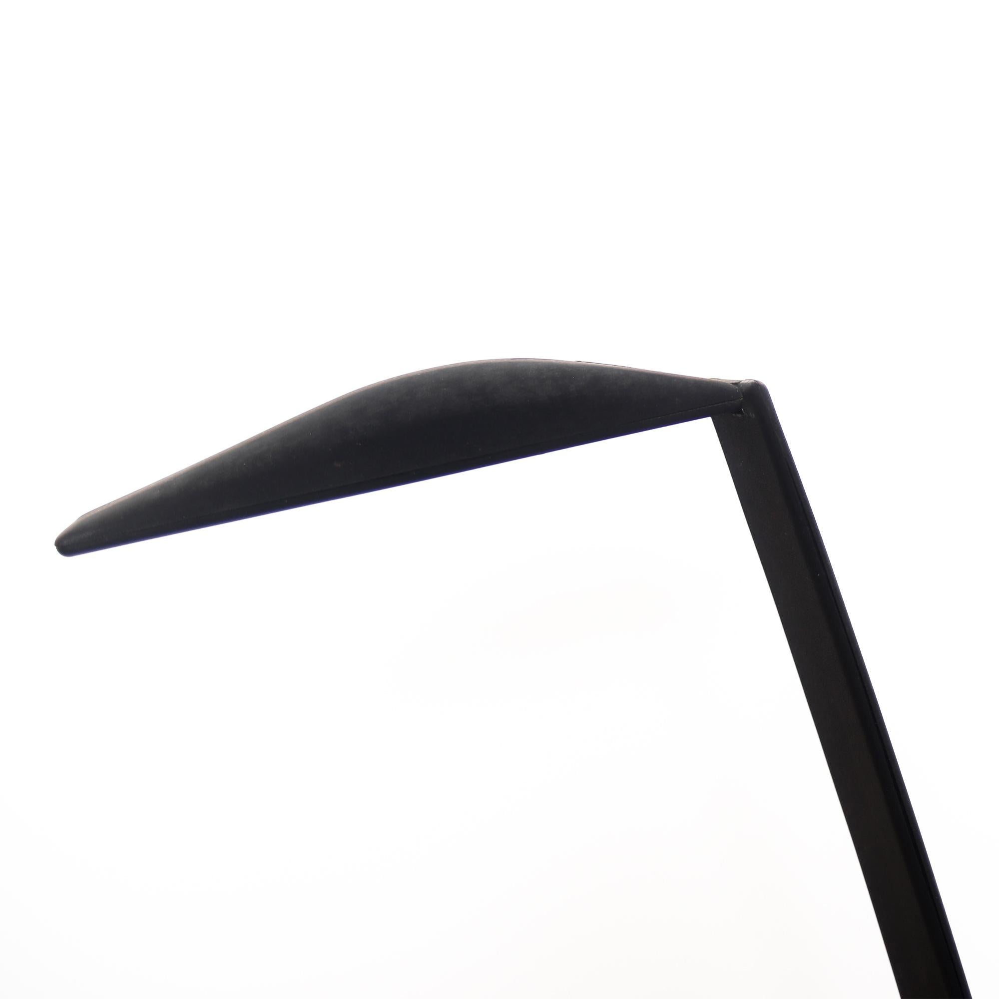 The “Dove” model desk lamp was designed by Mario Barbaglia and Marco Colombo for PAF Studio in Milan, Italy, 1980s
Made of black lacquered metal it is a swiveling base and the arm is adjustable up and down. Has a halogen bulb and an on/off switch.