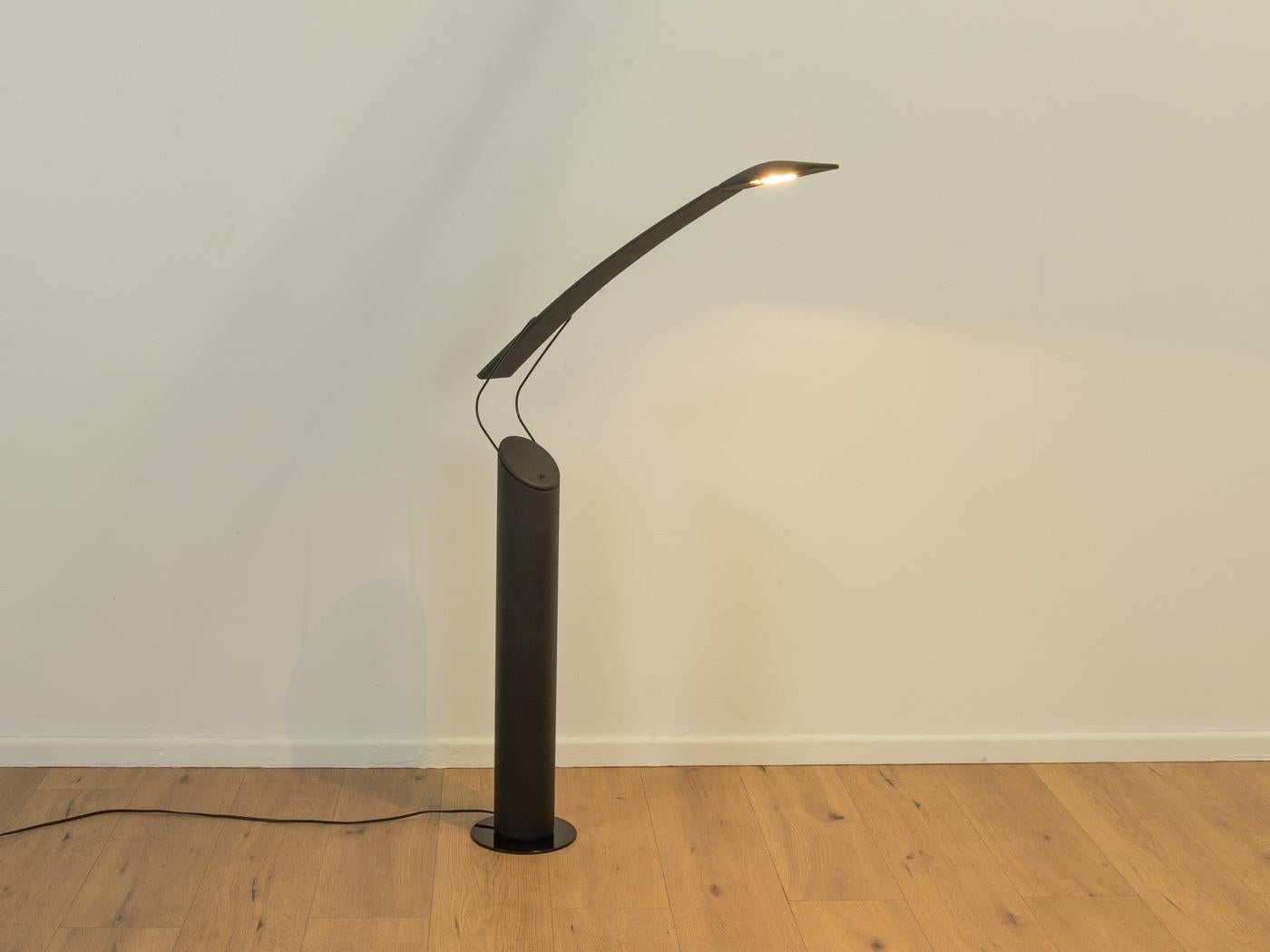 DOVE floor lamp by Mario Barbaglia & Marco Colombo for Italiana Luce from the 1980s. High-quality height adjustable stainless steel frame in black with adjustable lamp head.

Quality Features:
very good workmanship
high-quality materials
Made in