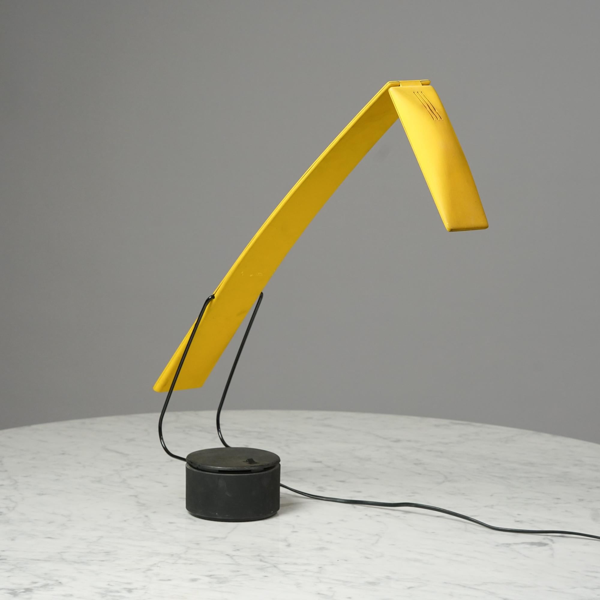 Dove lamp by Mario Barbaglia and Marco Colombo for PAF Studio in the 1980s. Metal stand and yellow plastic frame. Adjustable height. Good vintage condition, wear consistent with age and use. Manufactures mark on the bottom. 
