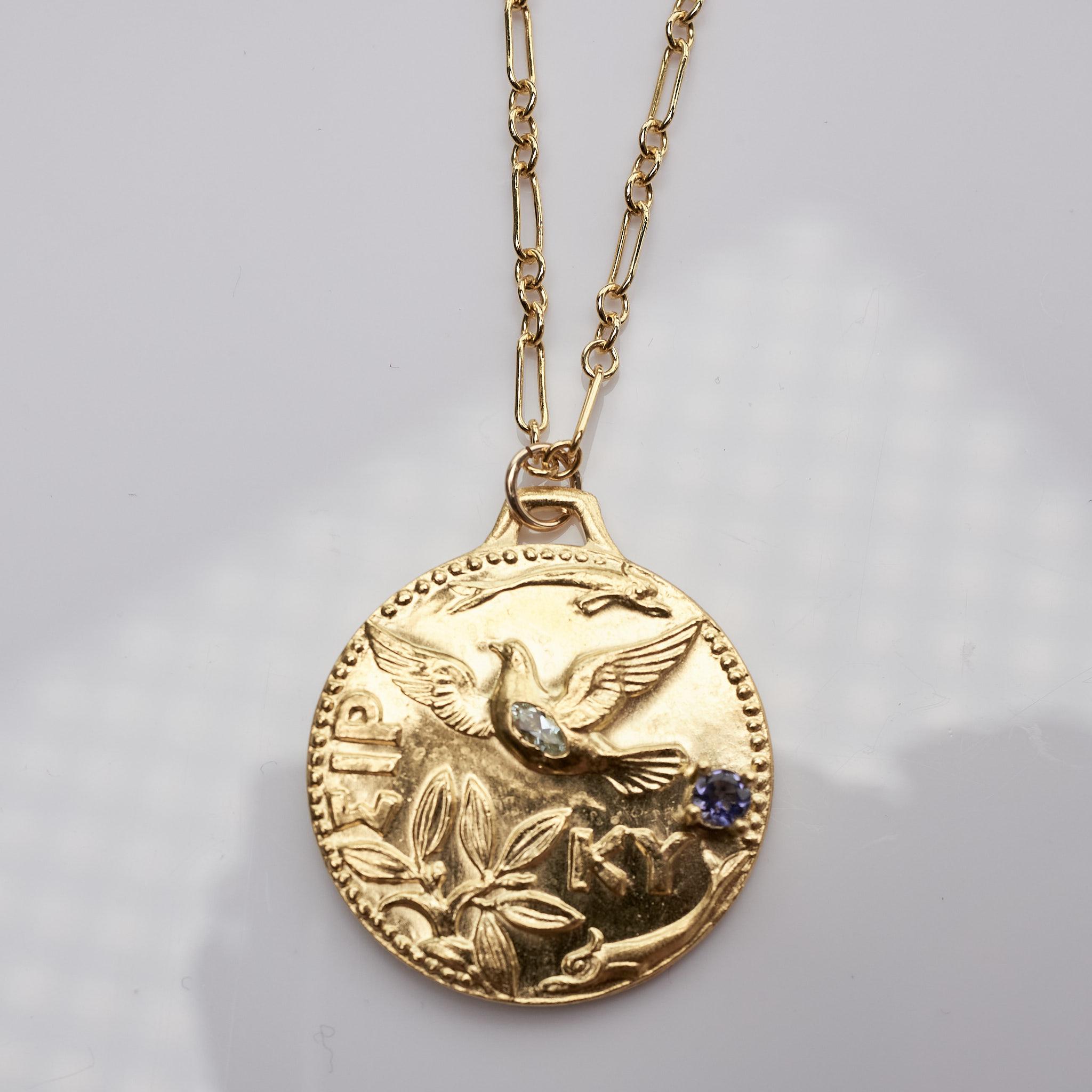 Dove Necklace Medal Aquamarine Tanzanite Bird

Designer: J Dauphin

Long Chain Medal Necklace  Dove 
Aquamarine Marquis Tanzanite Gold Filled Chain 28