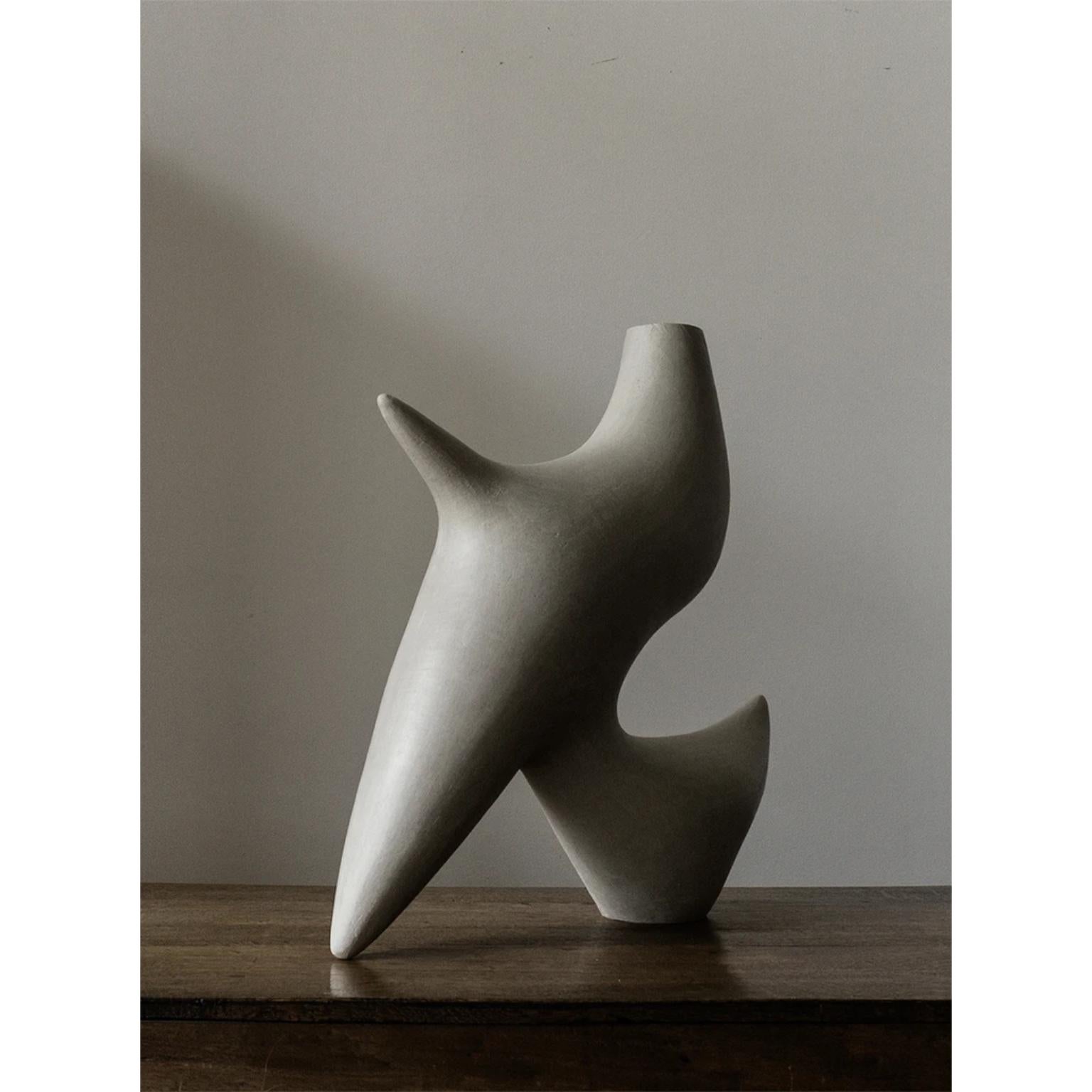 Dove vase by Cosmin Florea
Unique piece
Dimensions: W 40 x D 15 x H 45 cm
Materials: Stoneware

Inspired by my love for pristine nature, this sculptural vase channels the shape of a dove.
Handcrafted in white stoneware, the Dove vase can be