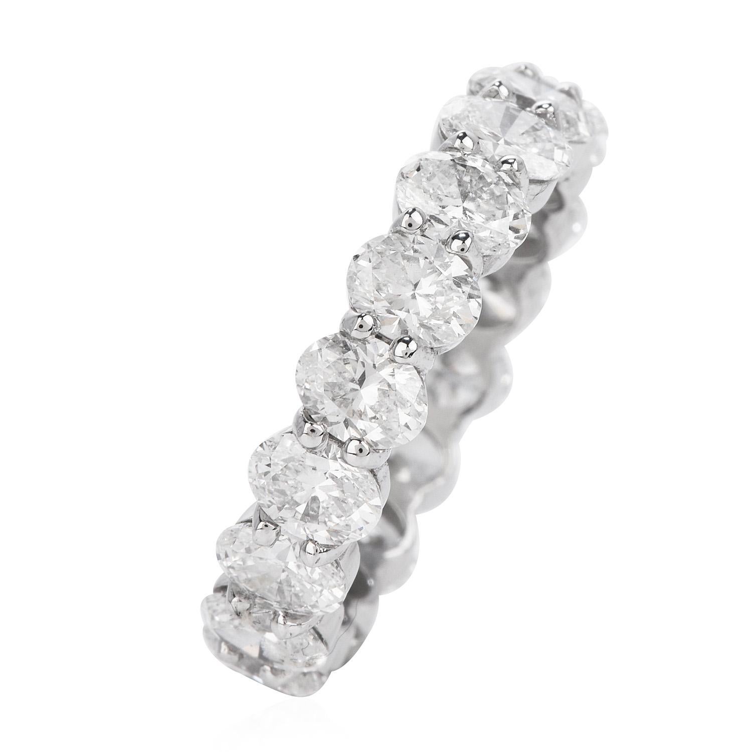 Sparkling from every angle, this eternity Wedding band ring with Oval Diamonds is the perfect compliment for any bridal set!

Crafted in solid 14K white gold, it is adorned by (18) oval cut, pave set, genuine diamonds weighing

in total 4.32 carats,