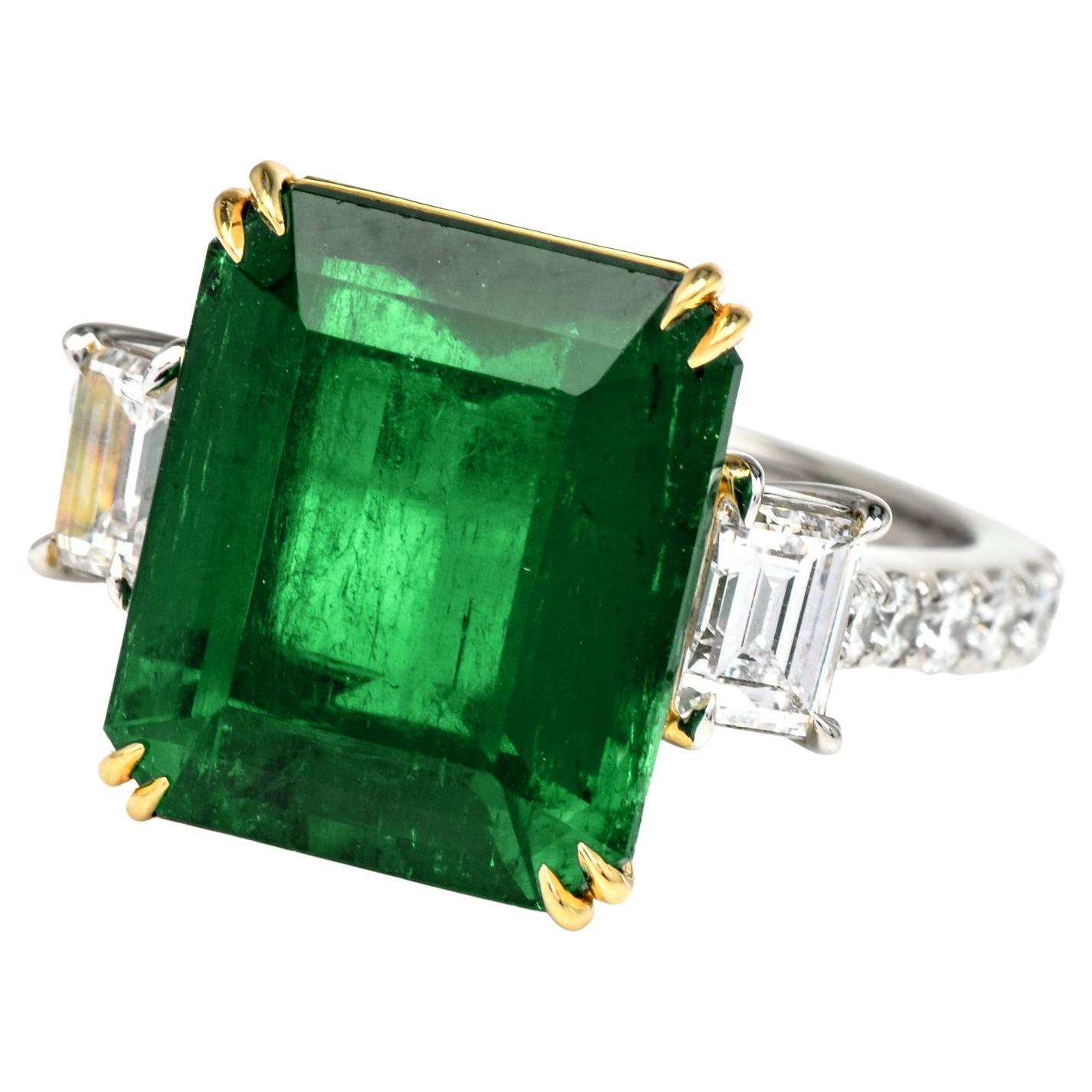 Treat yourself to this irresistibly stunning Diamond 8.64 carat Colombian Emerald 18K Gold Large Cocktail Ring! 

Crafted in platinum and 18K white gold, the center Deep Green Rare Colombian Emerald of approximately 7.24 carats, emerald-cut,
