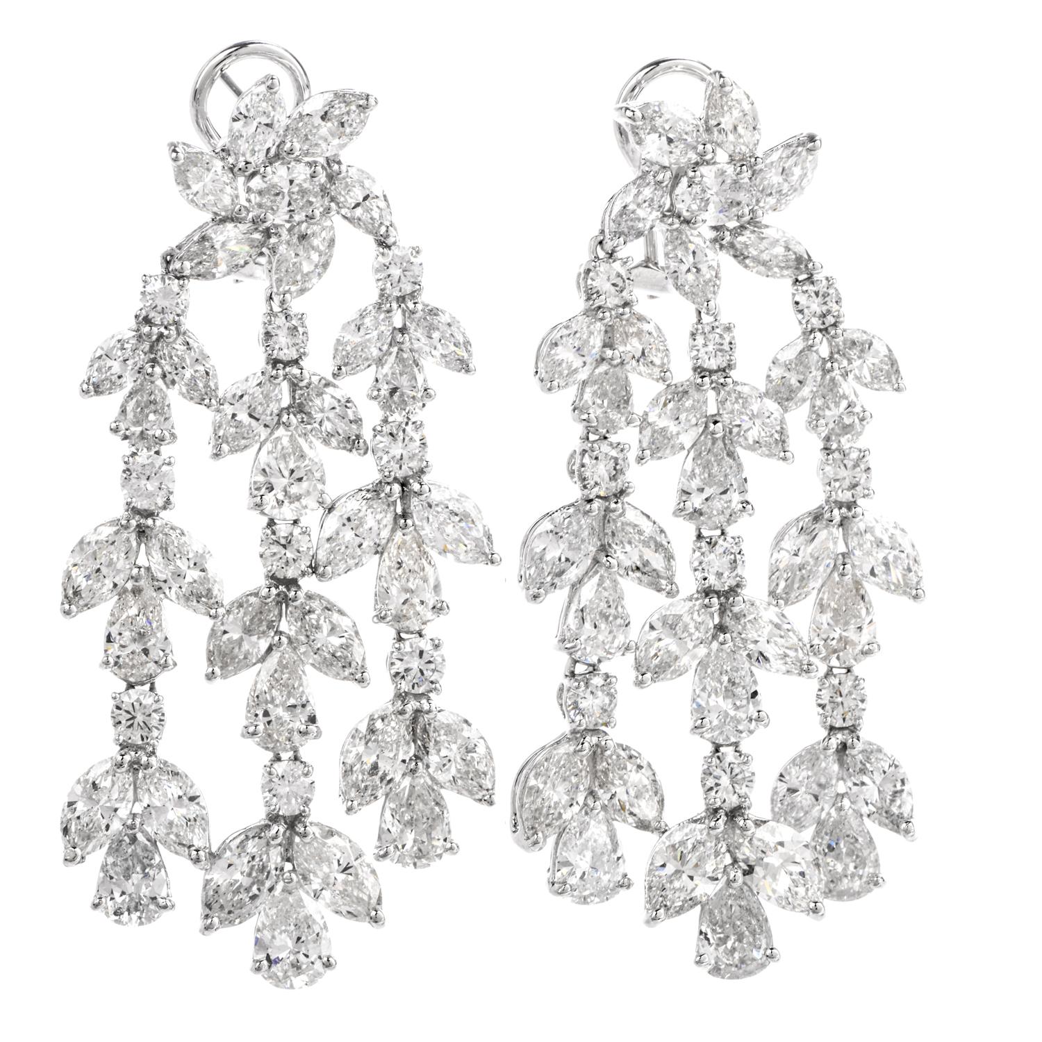 This one of a kind, stunning pair of Diamond Chandelier earrings is inspired with a floral motif with omega clip backs and crafted in luxurious Platinum with a combined diamond weight

of approximately 30.00 carats and are G-H color and Very Nice