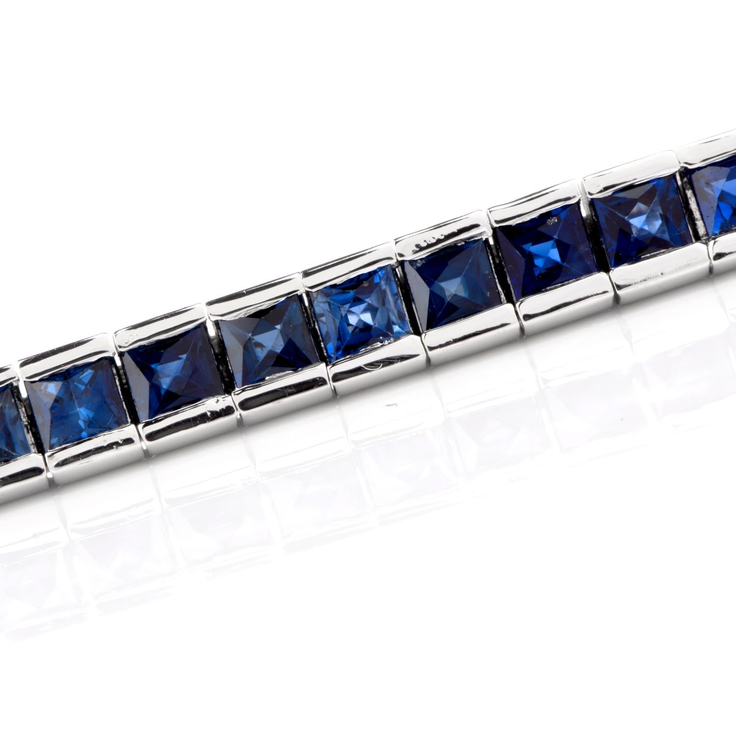 This luxurious blue sapphire flexible tennis bracelet is crafted in solid platinum, weighing 28.9 grams and measuring 6.70” around the wrist x 4mm wide. Composed of 56 channel set  genuine square-cut blue sapphires of deep color, collectively