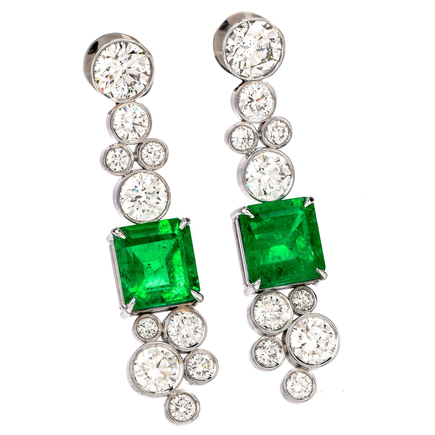 Admire these gorgeous Estate Diamond Colombian Emerald 18K Gold Drop Earrings! 

These dangle drop earrings are crafted in 18 karat white gold. They display two bright genuine Colombian emeralds, square Assher cut, prong set, approximately 5.23