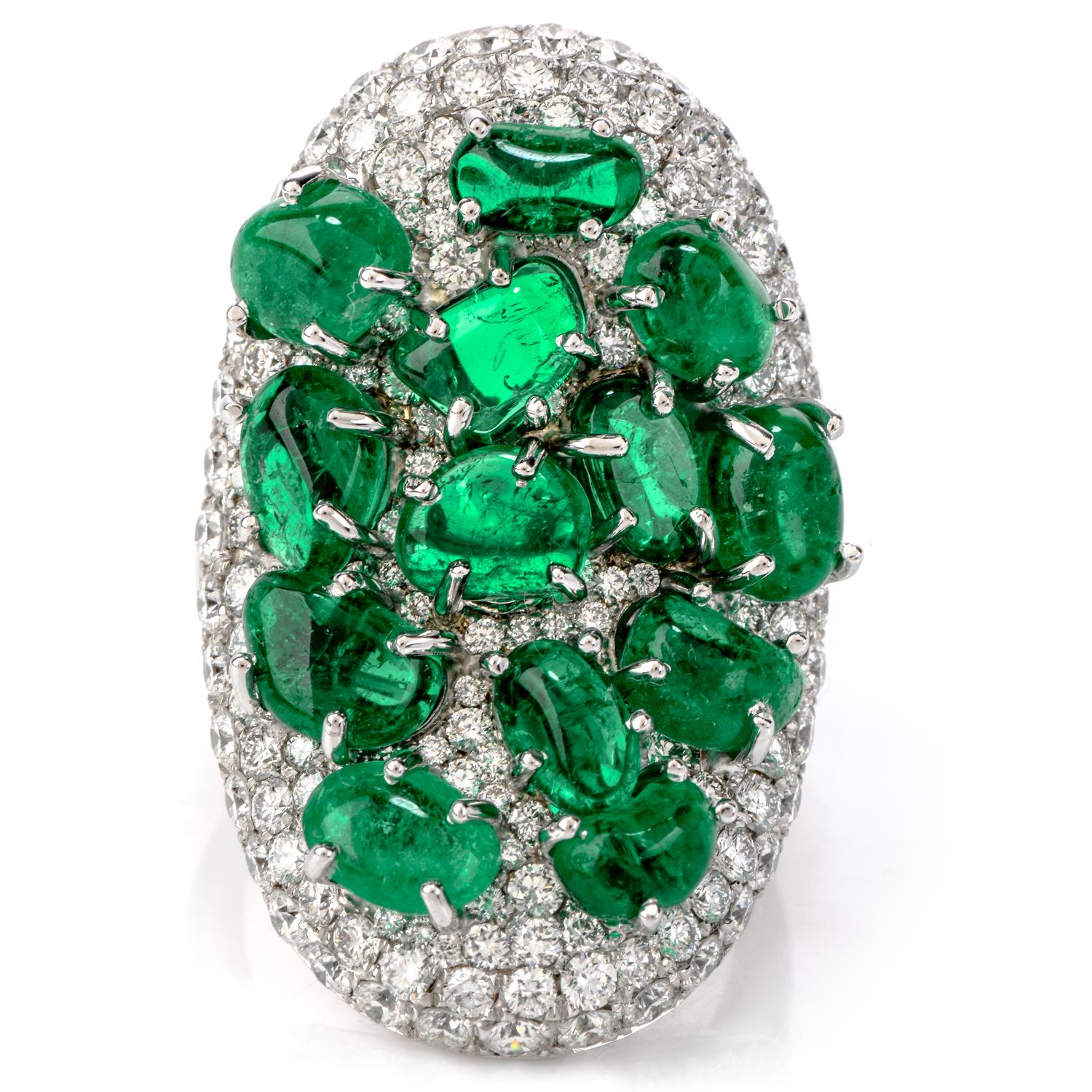 Be exciting and bold with this vivid Estate Diamond Colombian Emerald Platinum Cabochon Cluster Ring!  This bright large cocktail ring showcases approximately 13 genuine green Colombian Emeralds of 10.01 carats with minor inclusions.  They are a