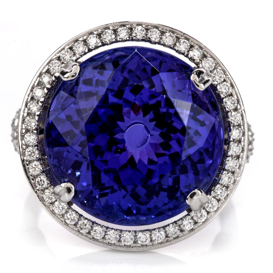 This superb quality tanzanite diamond bedded inside hand crafred Platinum mounting.  

 Centered with a round cut genuine tanzanite weighing approx. 21.61 carats, blue purple color

Its premier is pave set with natural round diamond as well as under