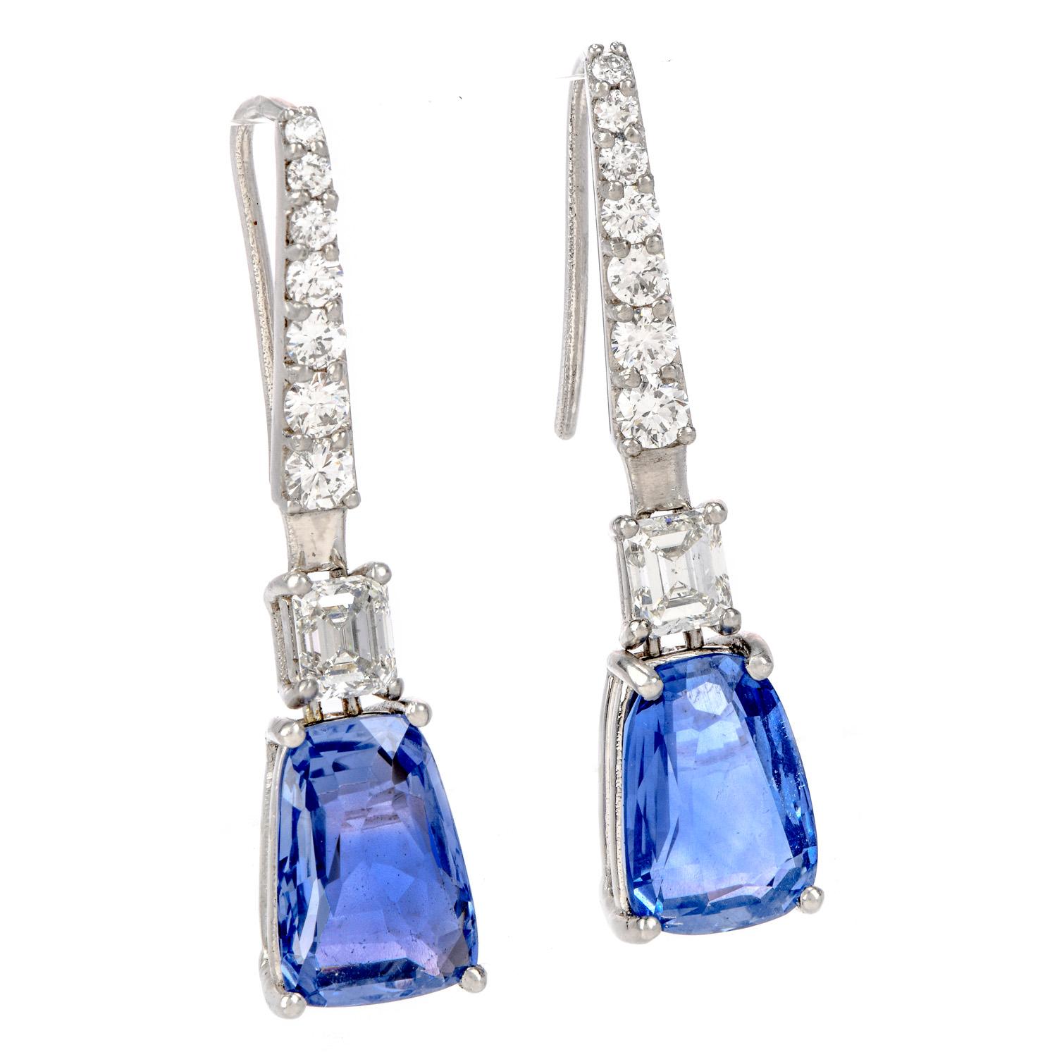 Set the example of pure elegance with these gorgeous GIA Diamond No Heat Ceylon Sapphire Platinum Drop Earrings!
These earrings hold two GIA certified sapphires of a modified trapezoid mixed cut, transparent clarity and weighing in at 8.27 carats