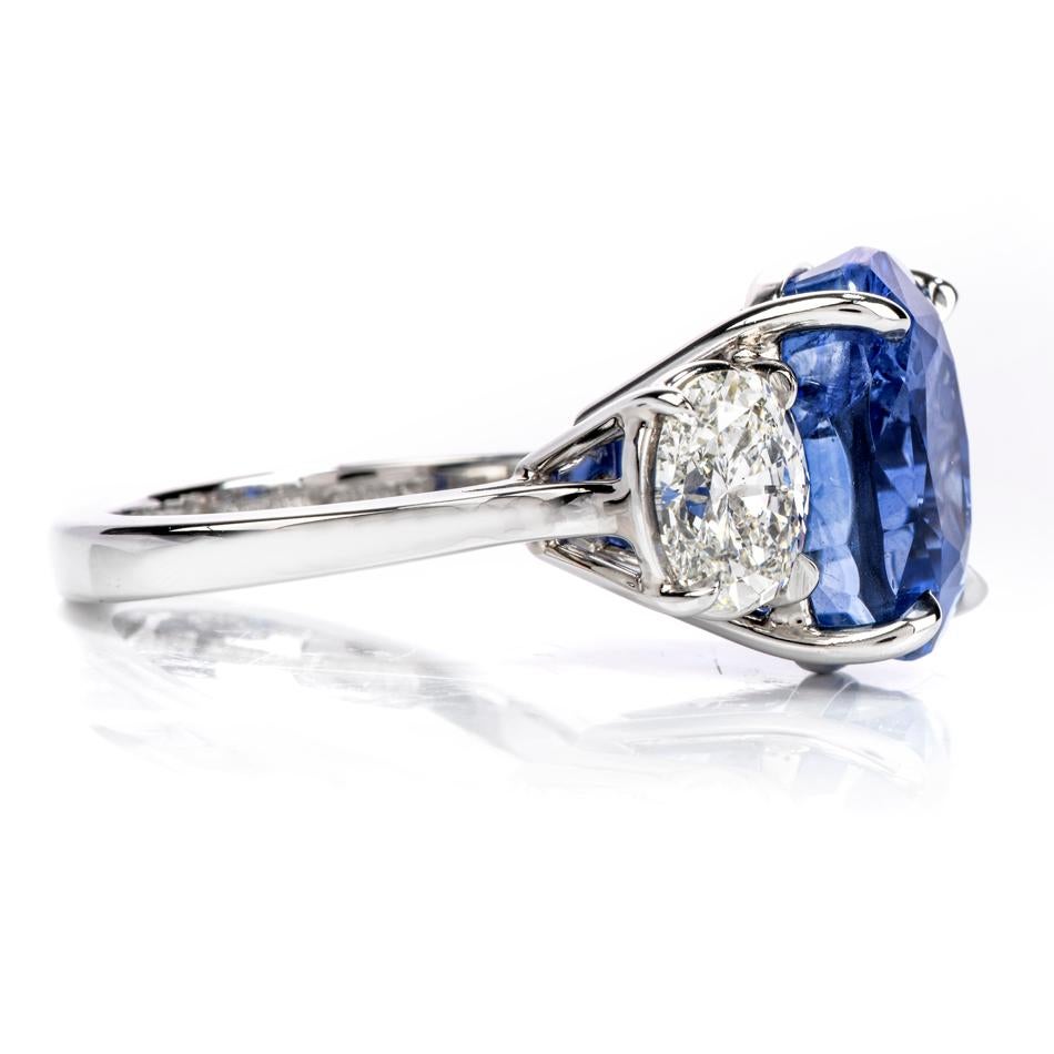 Your heart will drop to the floor when you gander at this intense GIA 14.23 Carat Blue Oval Cut Sapphire & Diamond Platinum Ring!  This Natural  No Heat Treatment, Ceylon blue sapphire center stone will have you at a loss for words, with its