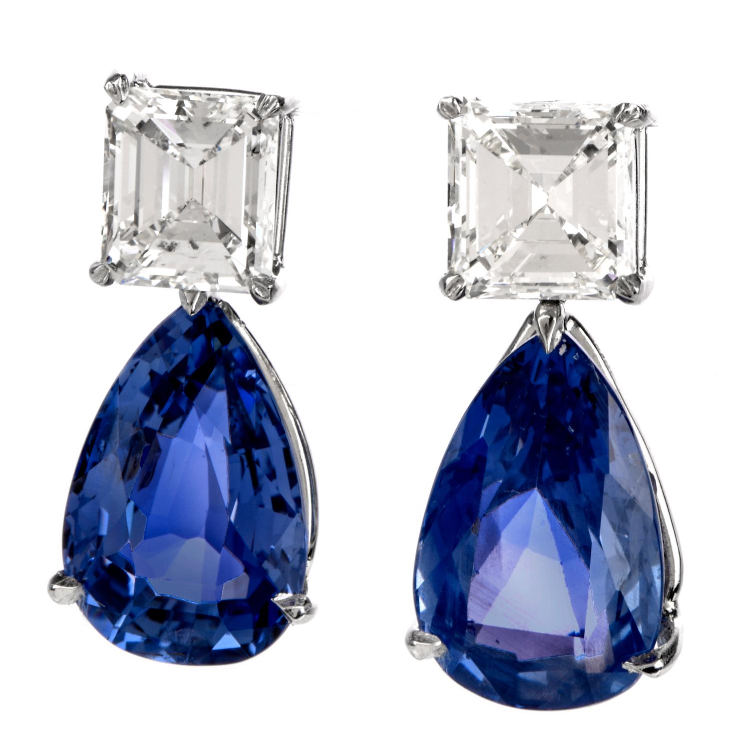 These stunning natural blue sapphire and diamond drop earrings are hand crafted in solid platinum. weighing 10 grams and measuring 24mm long x 11mm wide. Exposing a pair of prong-set, pear brilliant-cut natural corundum Sri Lanka blue sapphires,