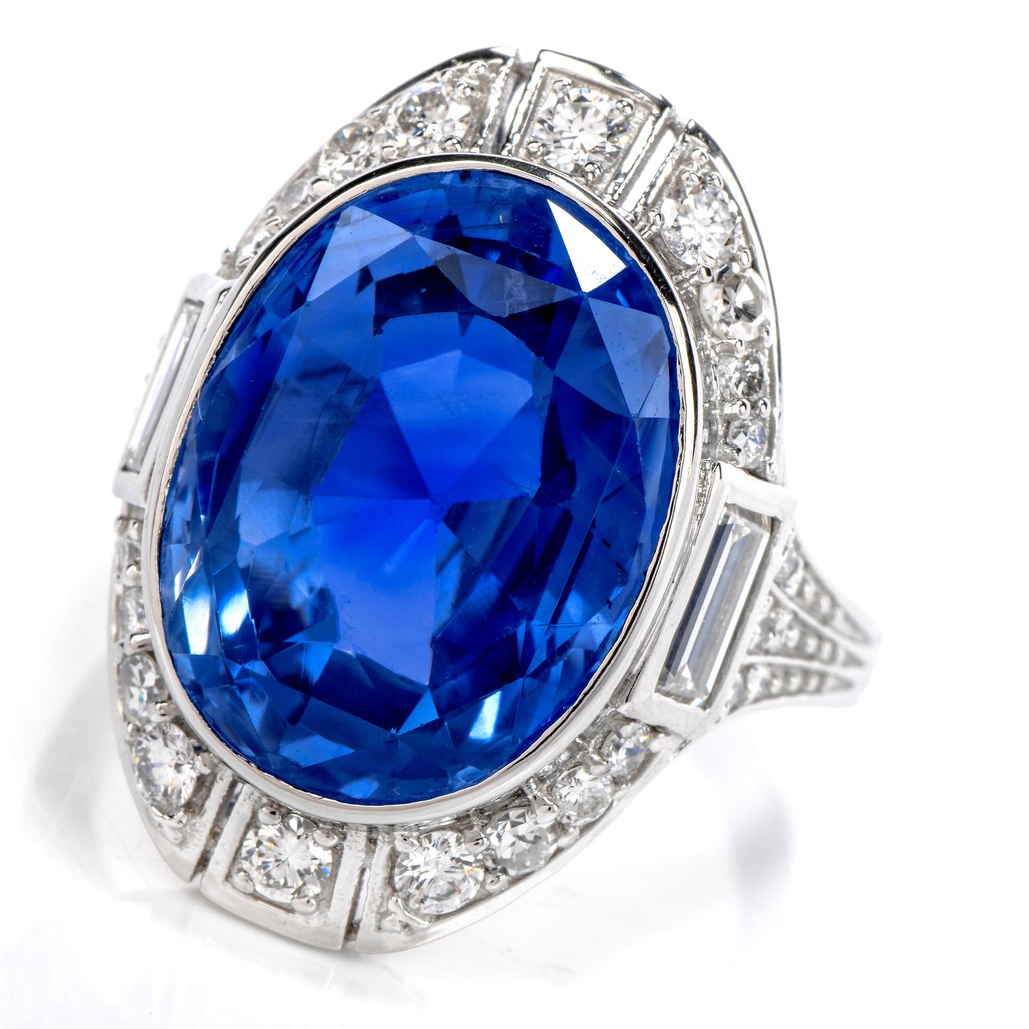 Fall in love with this magical GIA Natural No Heat Sri Lanka Sapphire Diamond Platinum Ring!  The large 16.17-carat center stone is set in a Deco-style diamond and platinum mounting.  The approximately 32 natural accent diamonds are round cut and