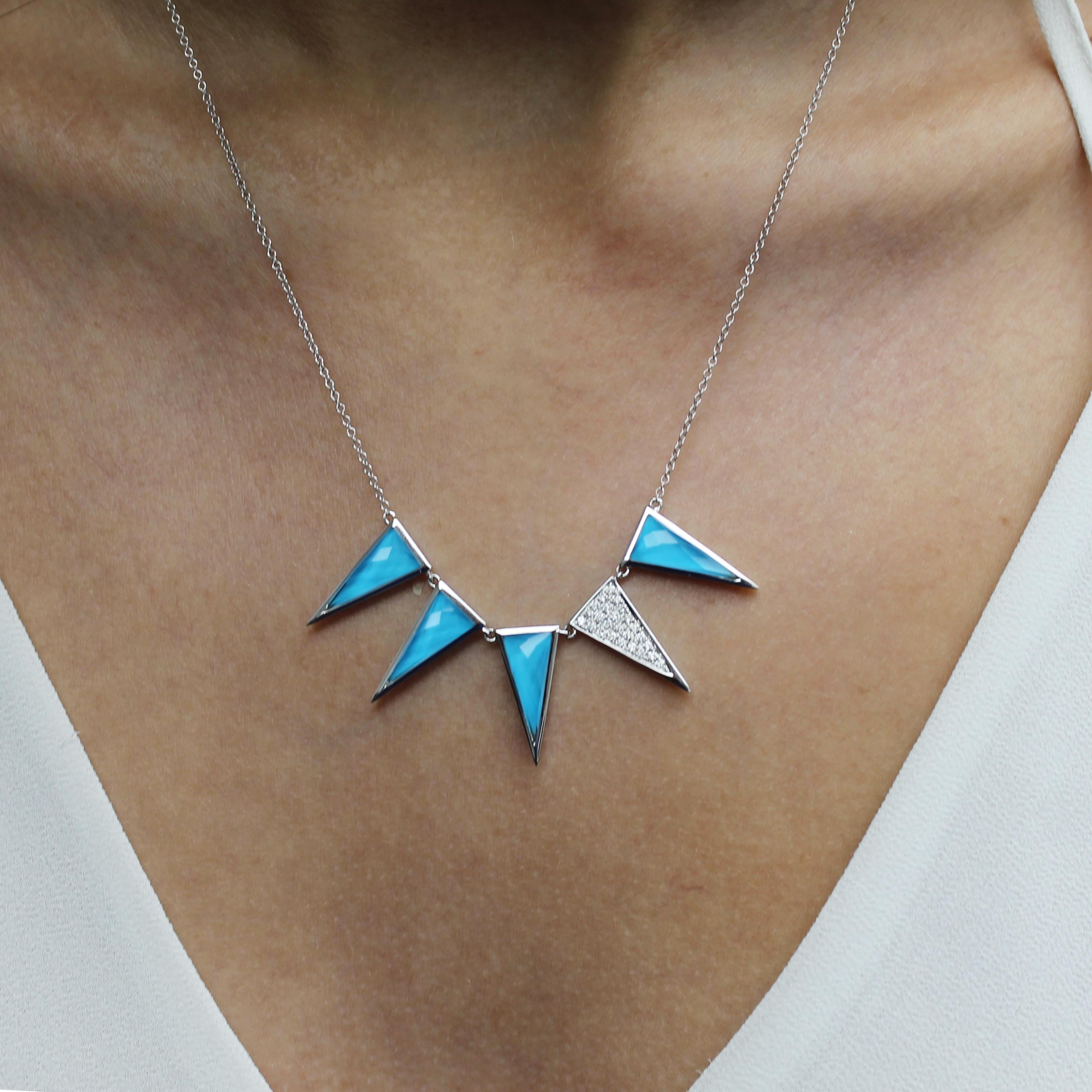 St. Barths Blue Dagger Necklace featuring (4) triangle stations of checker-cut, White Topaz layered with Natural Arizona Turquoise, and (1) Pave Diamond triangle, set in 18K white gold. Chain length is 18