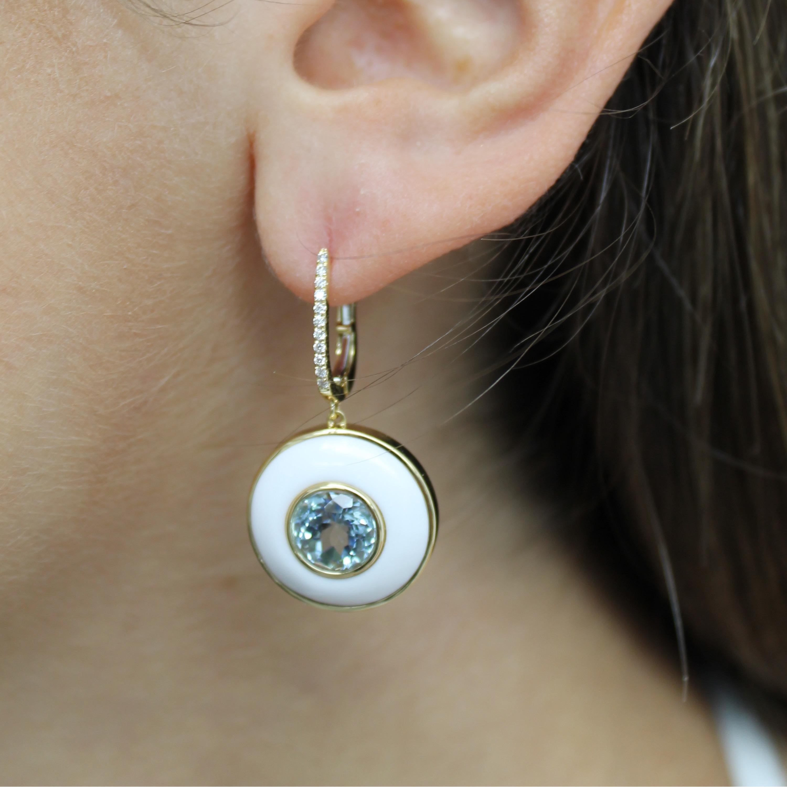 *Please allow 4-6 weeks for delivery*

Mykonos Earrings featuring round, bezel-set Sky Blue Topaz in a White Agate frame, diamond lever-back tops, in 18K yellow gold. The Mykonos collection from Doves by Doron Paloma pays homage to the serene blue