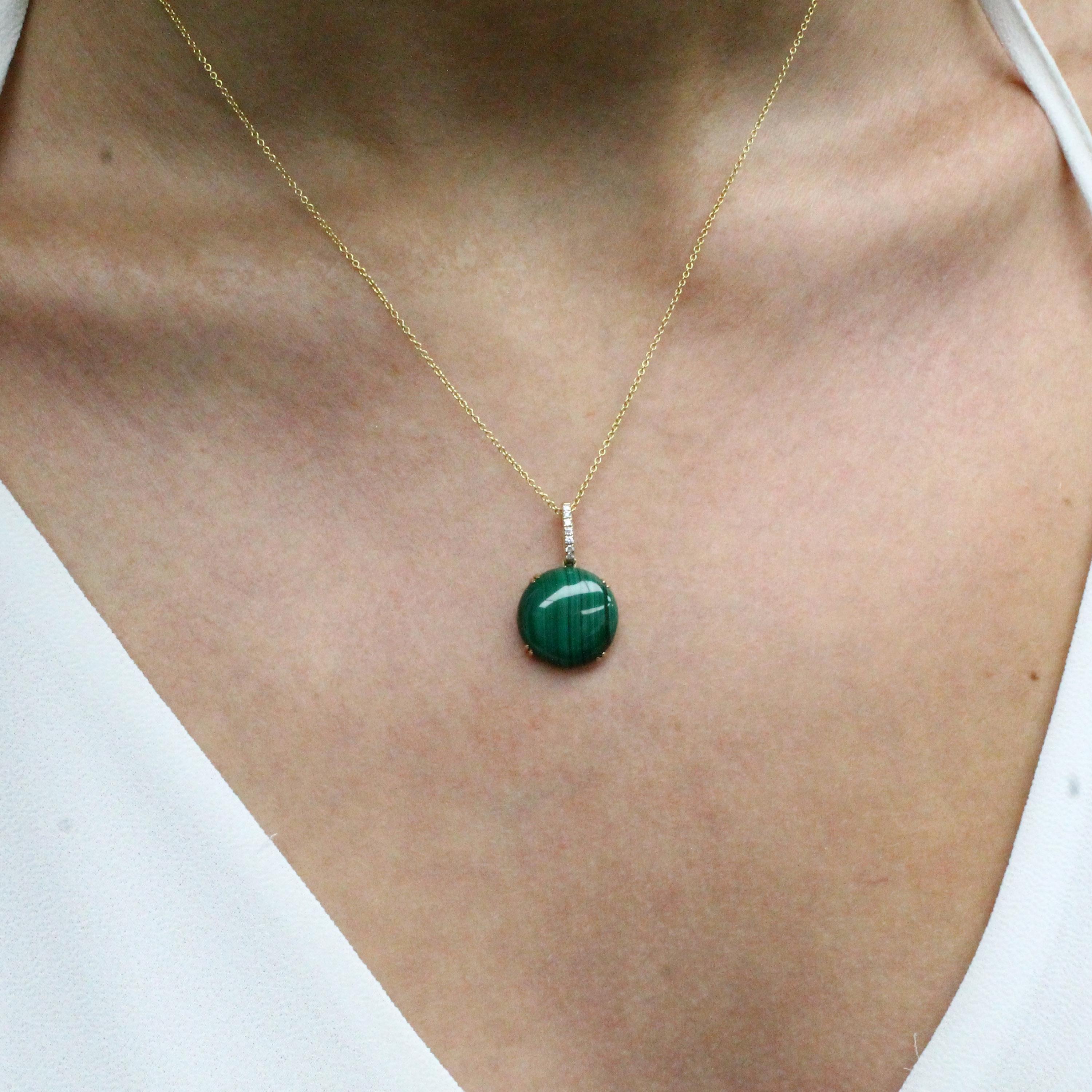 Verde Collection Necklace, with Round Cabochon-cut Malachite, a Diamond Bale, in 18K yellow gold. 18-inch 18K chain, with a 16-inch adjuster. Malachite is stone of balance and abundance, and often called 