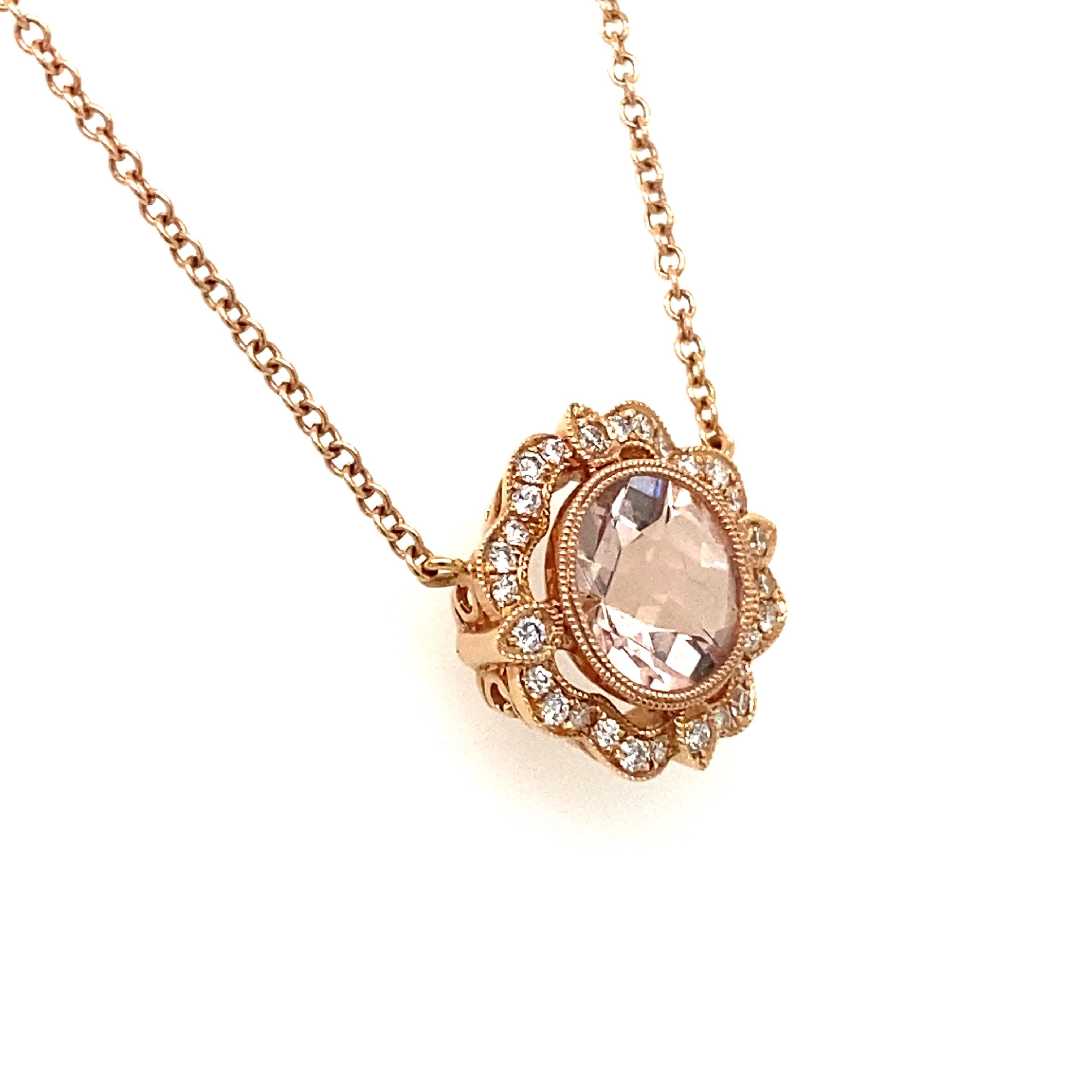 18 karat rose gold Morganite pendant necklace with diamond accents. 28 diamonds 0.18 carat total weight. 18 inch long chain.