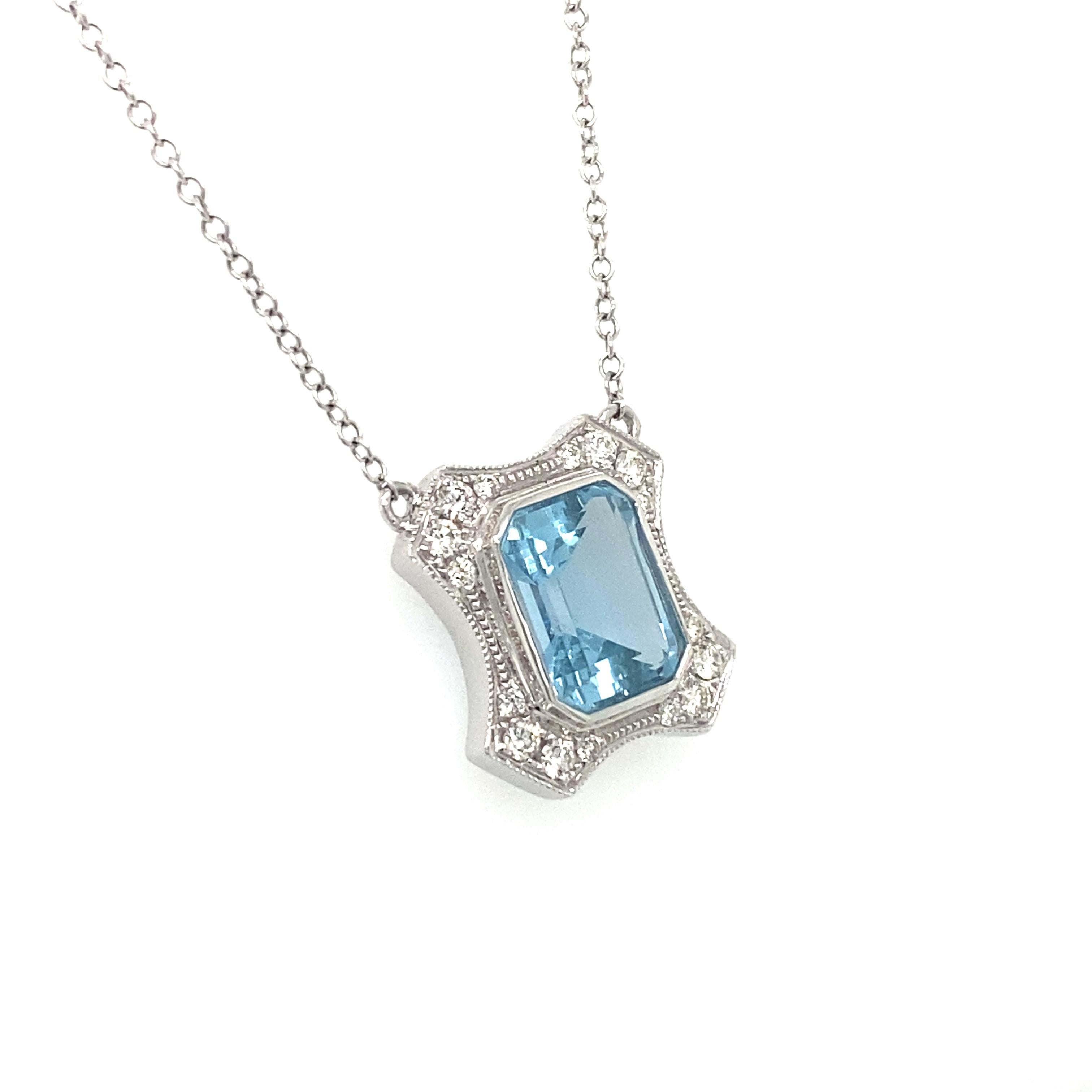 18 karat white gold 2.04 carat Aquamarine pendant with 16 diamonds weighing 0.20 carats total. 18 inch long chain included.