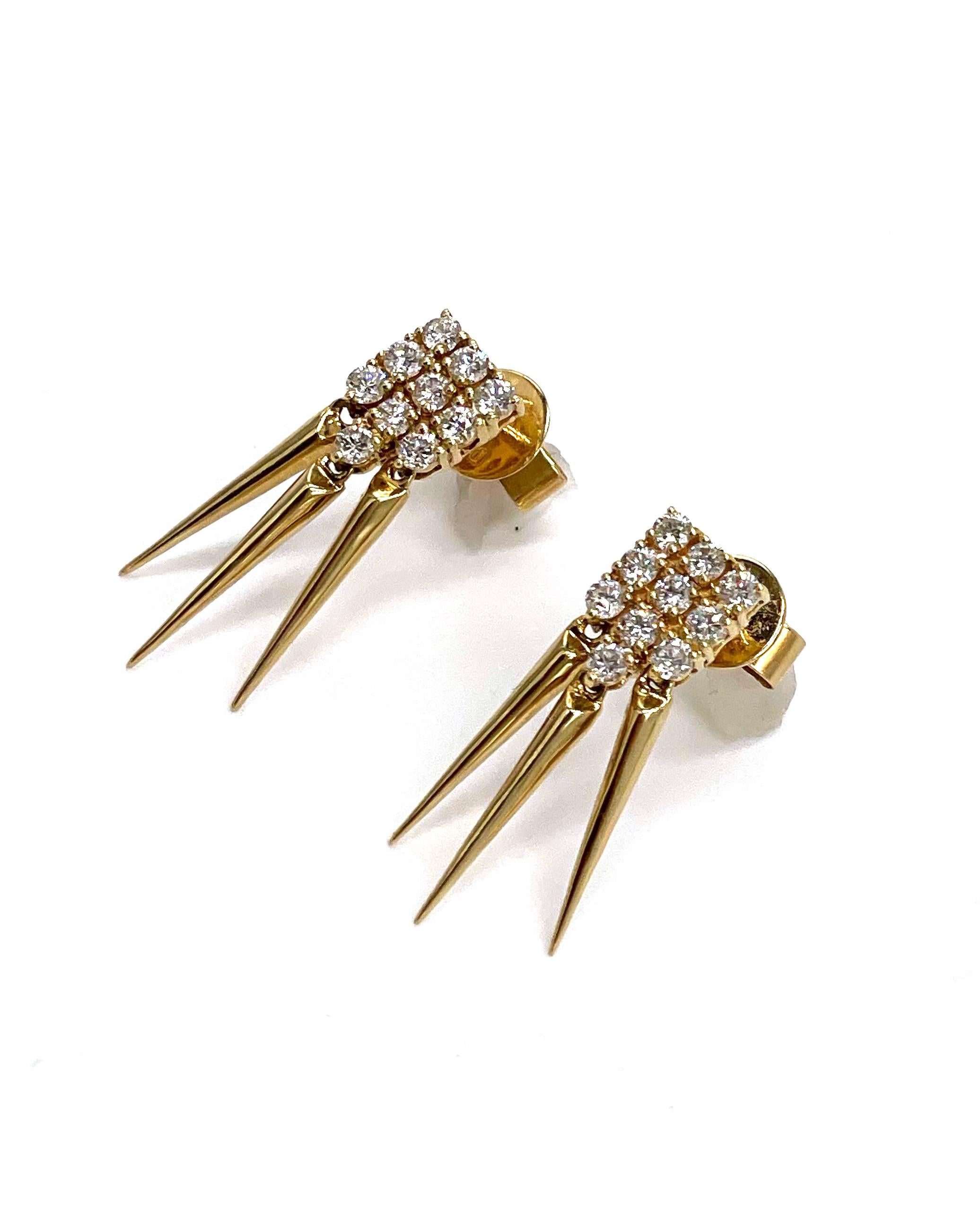Classy and edgy. This pair made by Doves by Doron Paloma is made of 18K yellow gold and diamonds.  The pair features a square shape top furnished with 20 prong set round brilliant-cut diamonds totaling 0.62 carats.  The earrings have dainty spikes