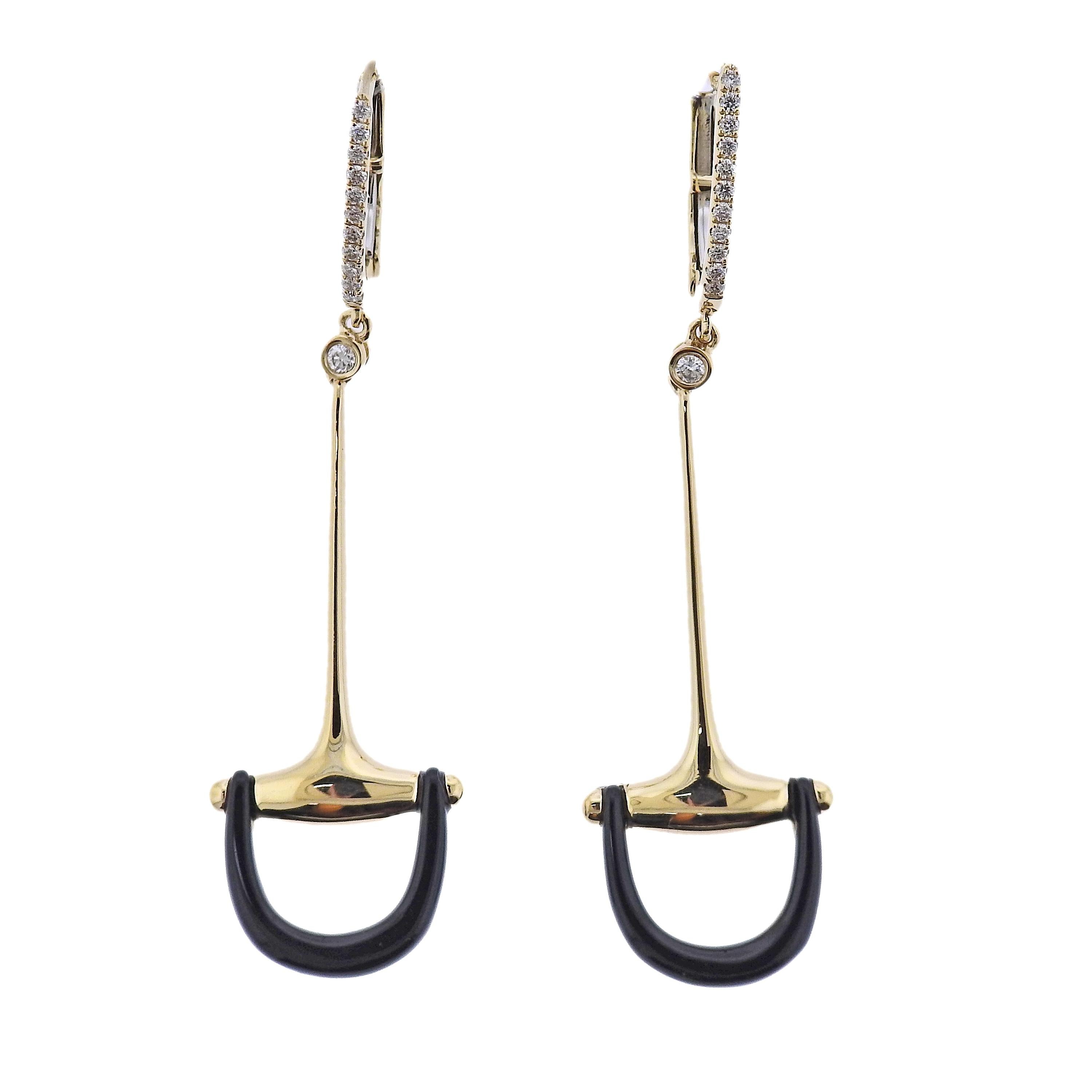 Brand new pair of 18k yellow gold horse bit earrings by Doves Doron Paloma , with onyx and 0.15ctw H/VS diamonds.  Earrings are 53mm long. Weight - 6 grams. Marked: 18k,  Dove hallmark. 