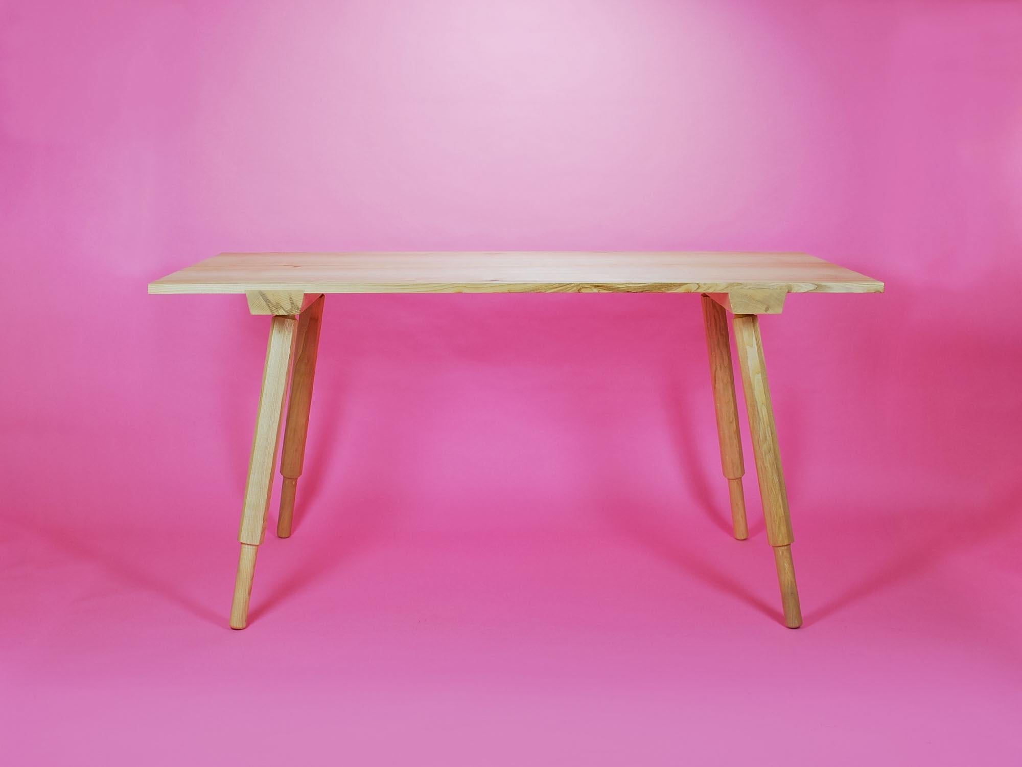 Solid Ash Dining Table with hand turned, screw in legs for easy assembly.

The table is constructed in beautiful English Ash. The legs are designed with a unique octagonal shape with smooth round feet at the bottom.

The legs screw into sturdy