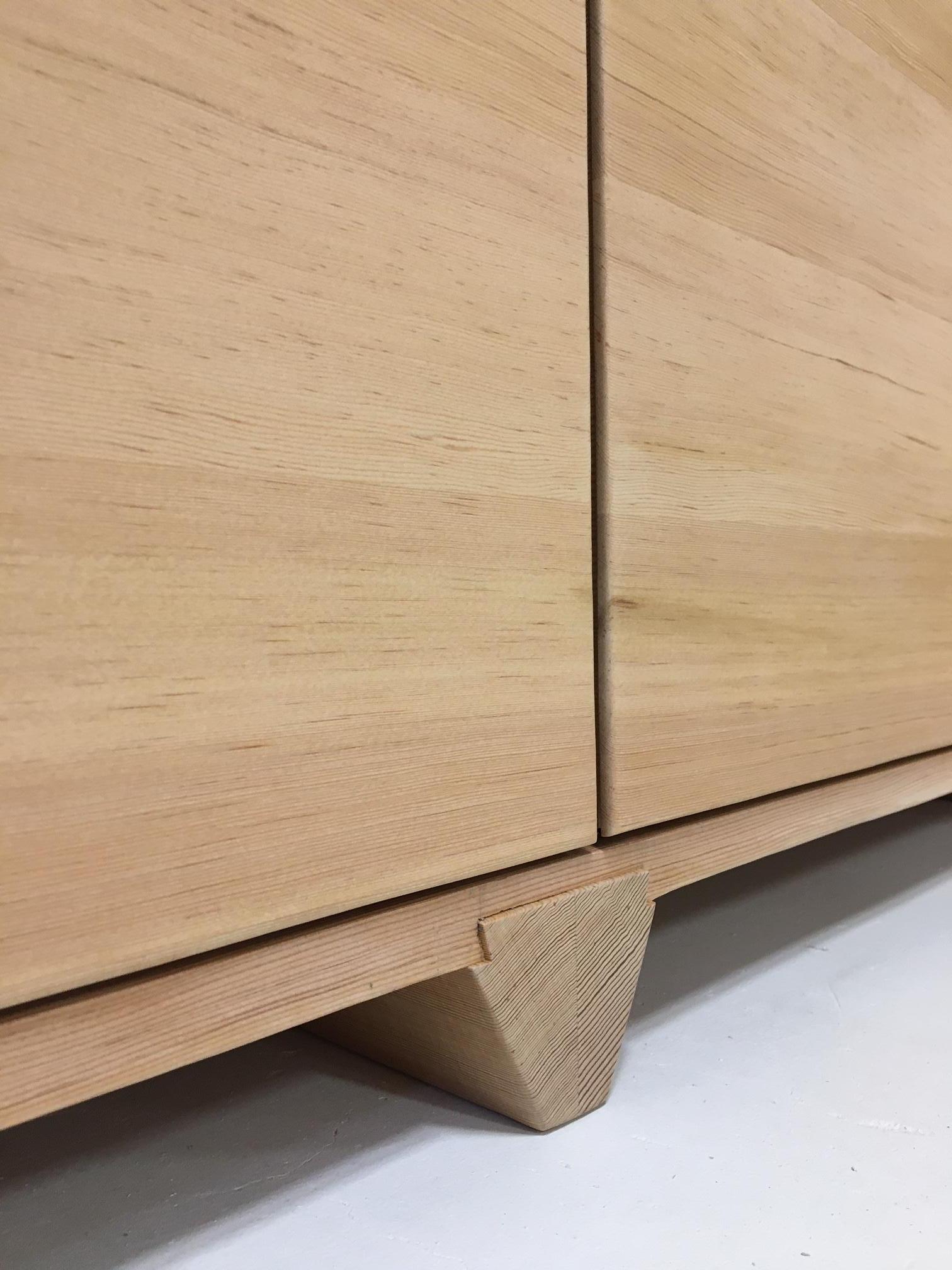 Master craftsmanship, timeless design. Made from solid wood vertical grain douglas fir, this elegant credenza will bring warmth and serenity to the space it lives in. Soft close doors and drawers add to the quiet calm of the piece. The oversized box