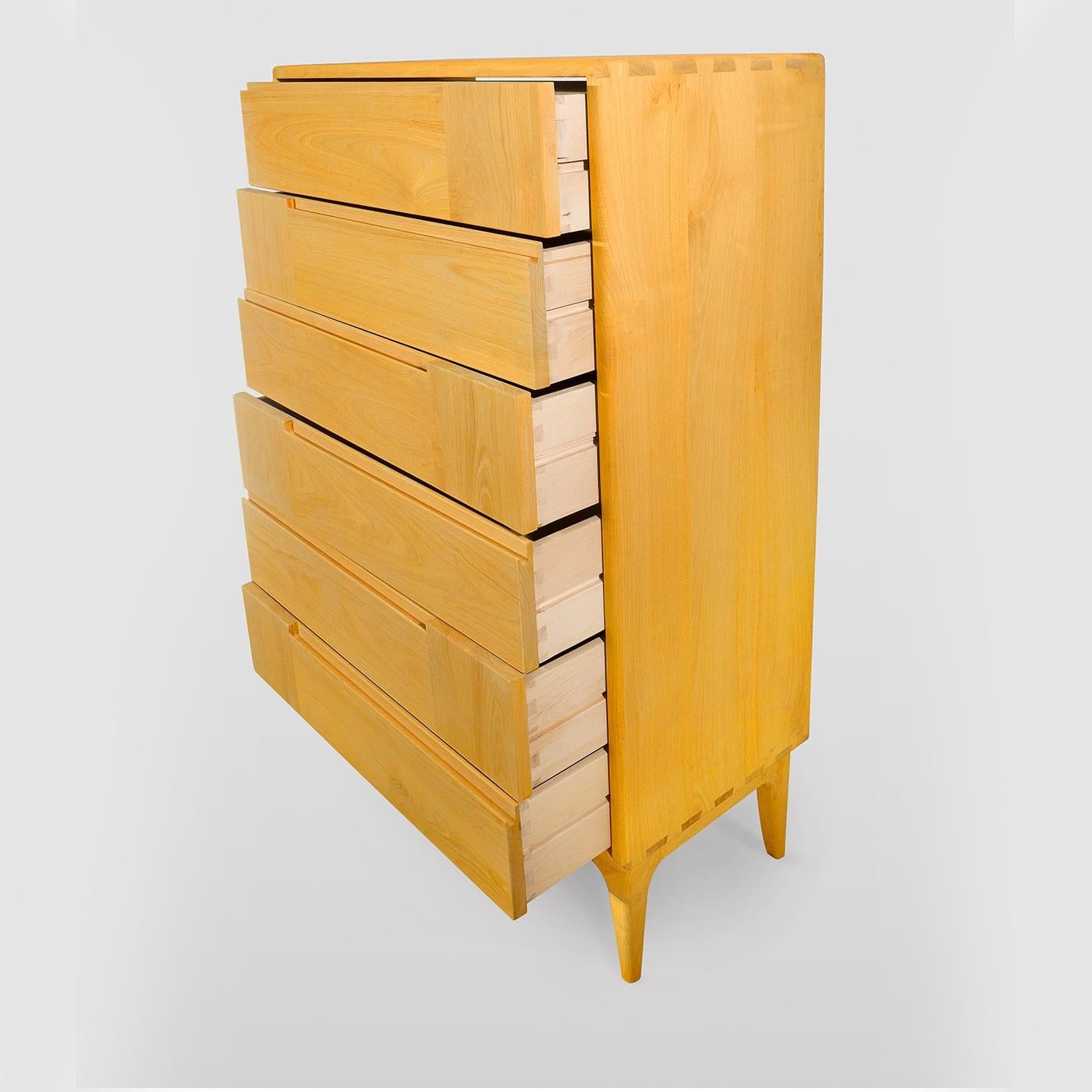 Lively and sophisticated, this Scandinavian-style dresser will make a singular addition to a contemporary interior. Handcrafted of solid chestnut, it features six drawers boasting horizontal and vertical lines, creating a practical groove that