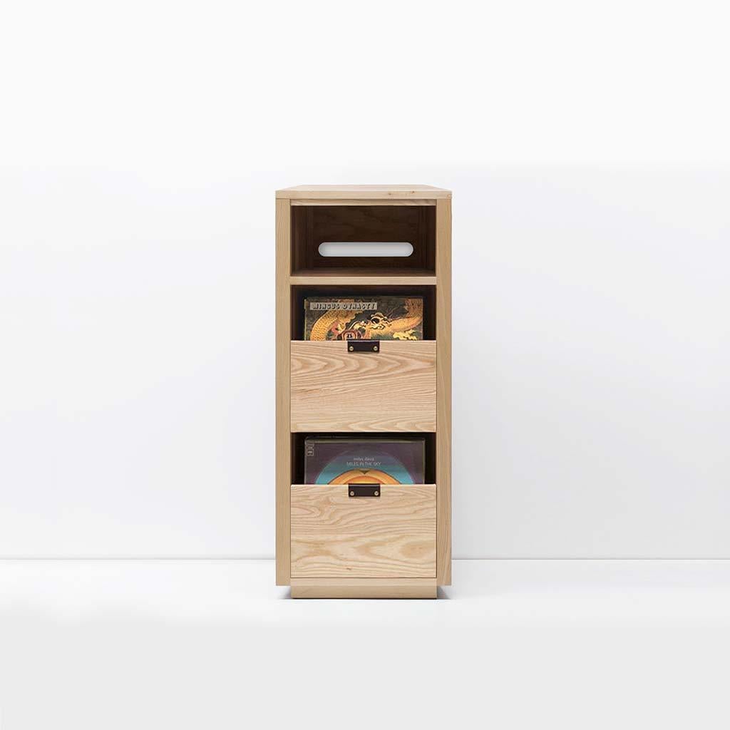 Our dovetail vinyl storage cabinets utilize a “file drawer” approach to store LPs and allow you to easily flip through an entire record collection while enjoying a visual display of record cover art across the front of the cabinet. The design