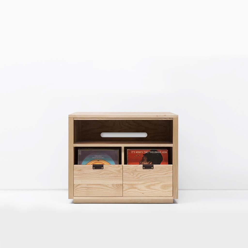 Our Dovetail vinyl storage cabinets utilize a “file drawer” approach to store LPs and allow you to easily flip through an entire record collection while enjoying a visual display of record cover art across the front of the cabinet. The design