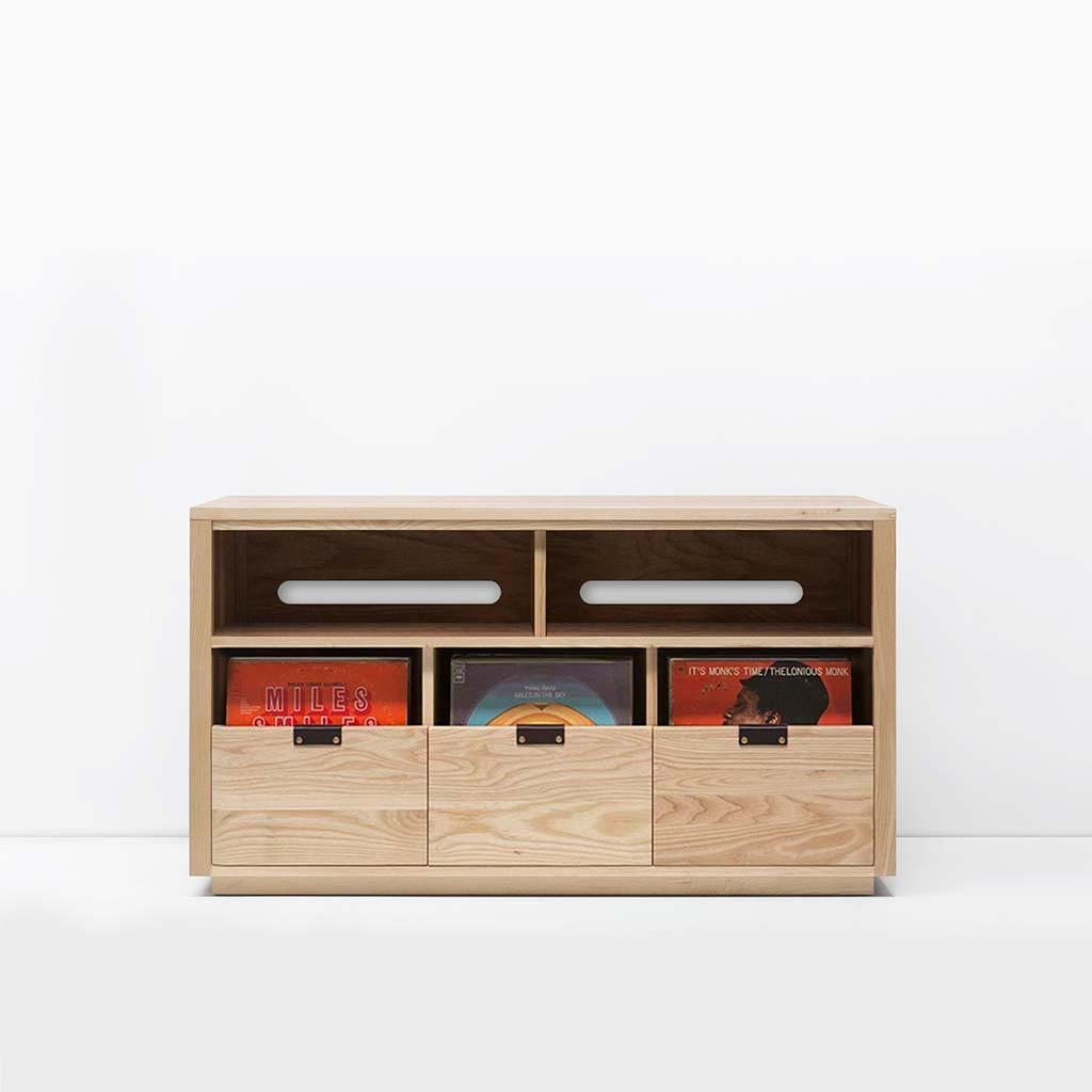 Our Dovetail vinyl storage cabinets utilize a “file drawer” approach to store LPs and allow you to easily flip through an entire record collection while enjoying a visual display of record cover art across the front of the cabinet. The design
