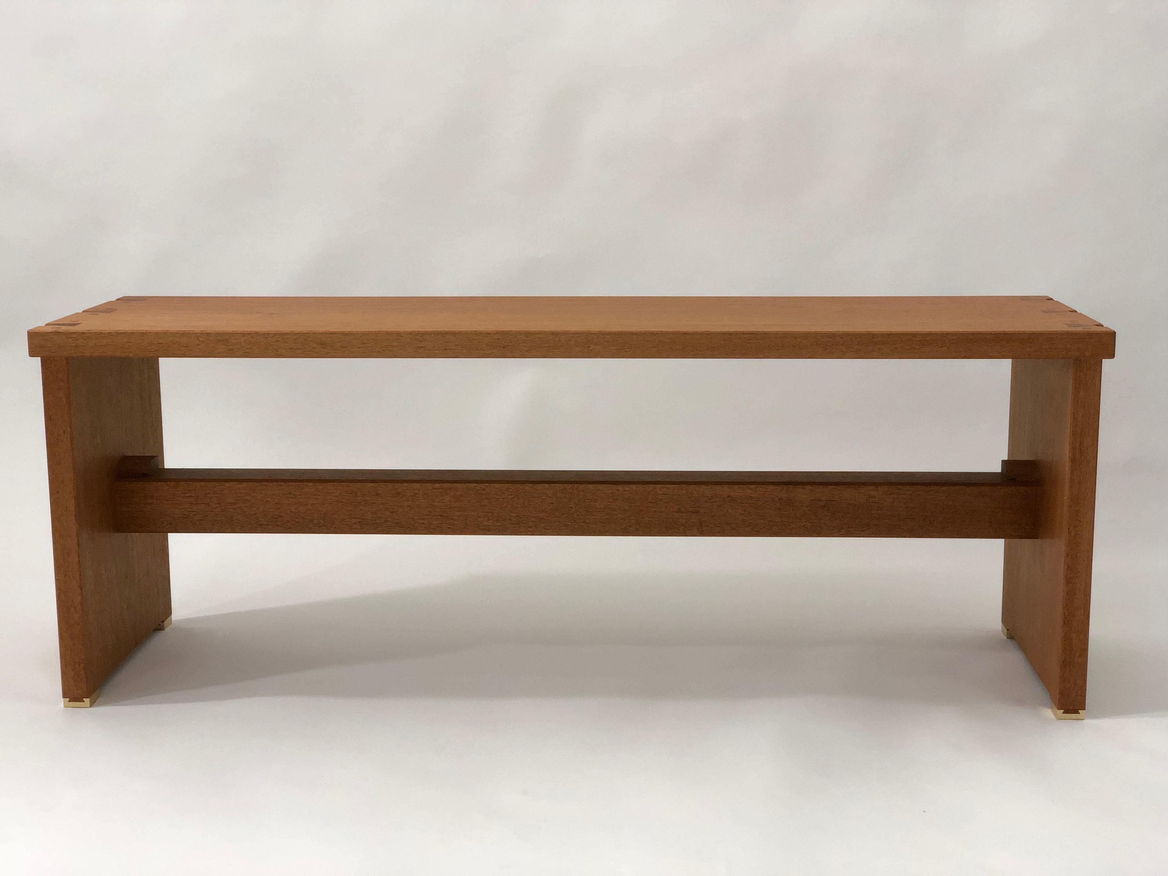 In designing this bench I took cues from sashimono, seeking a outwardly simple aesthetic which gives way to more elaborate detail upon a closer look. In building this bench I utilized joinery unique to Japanese timber carpentry. 

This bench