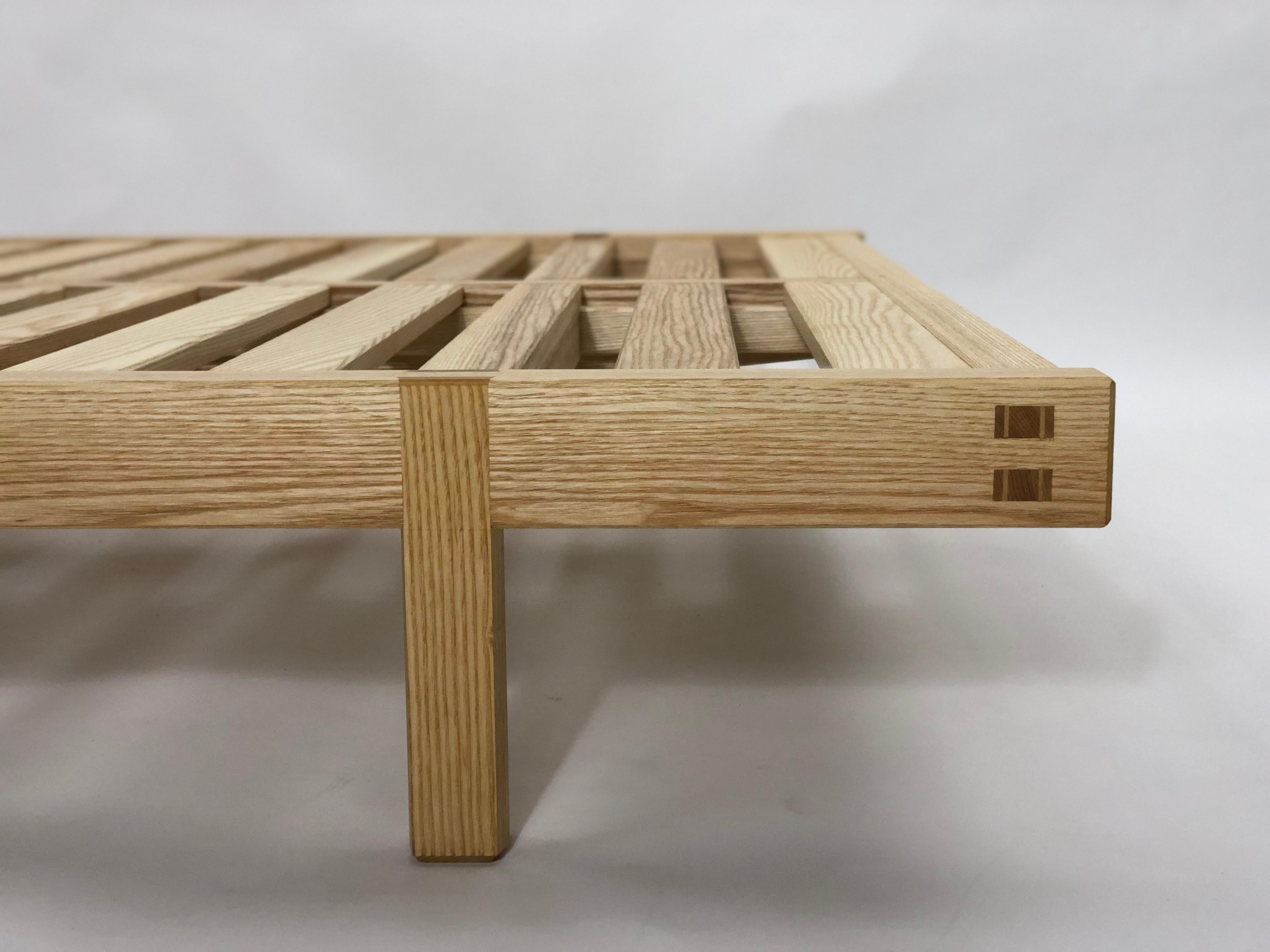 This bed is designed to accommodate a contemporary aesthetic. This design is carefully handmade, featuring detailed construction and traditional technique which utilizes the interlocking joinery found in Japanese temple carpentry and sashimono