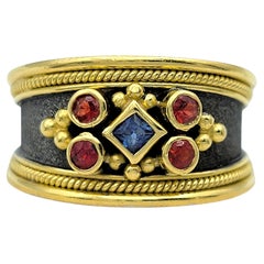 Dovris Rot und Blau Saphir Seil Detail Band Ring in 18 Karat Gelbgold