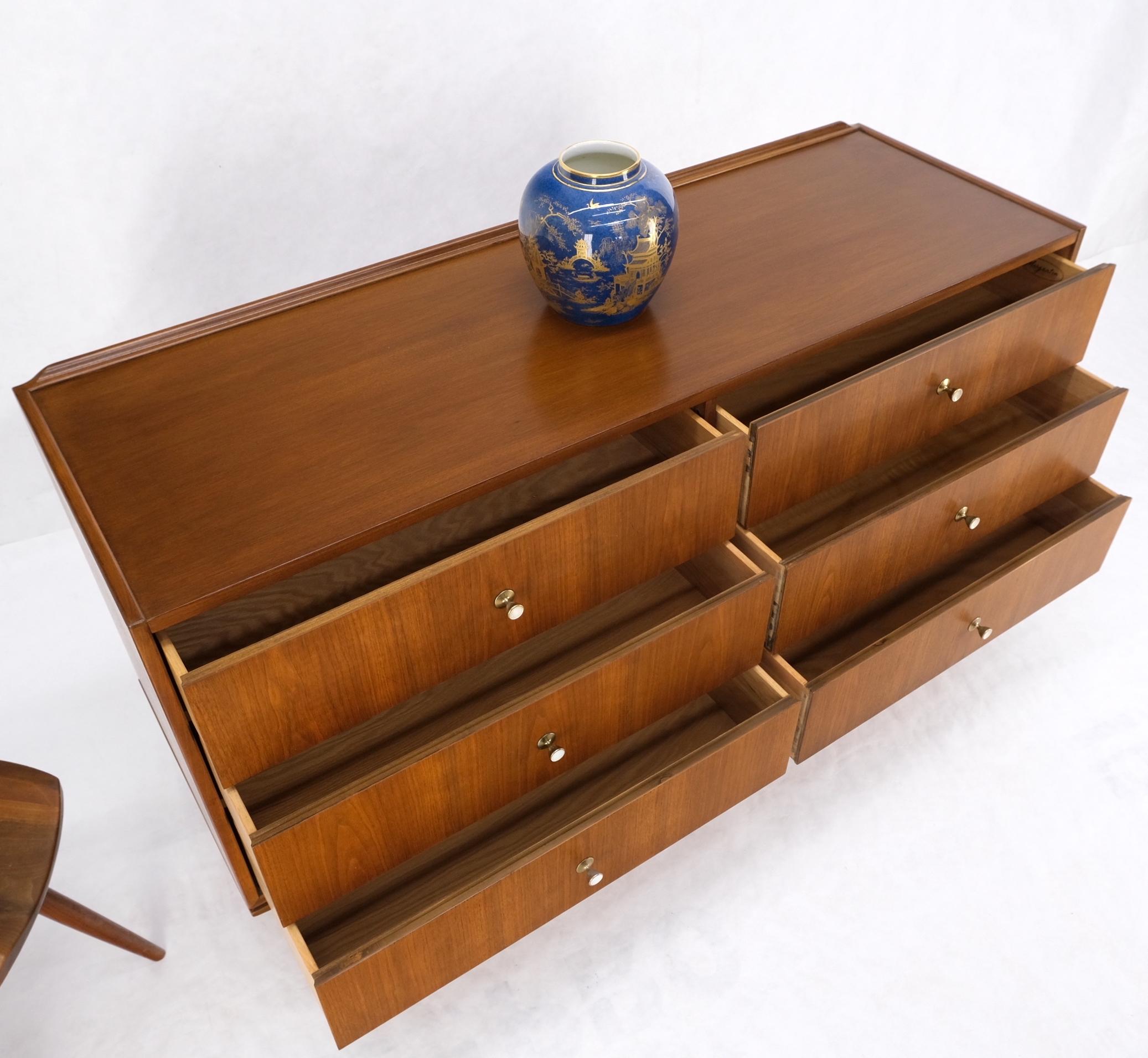 Dowel tapered leg walnut 6 drawers mid century dresser w/ back splash mint condition.