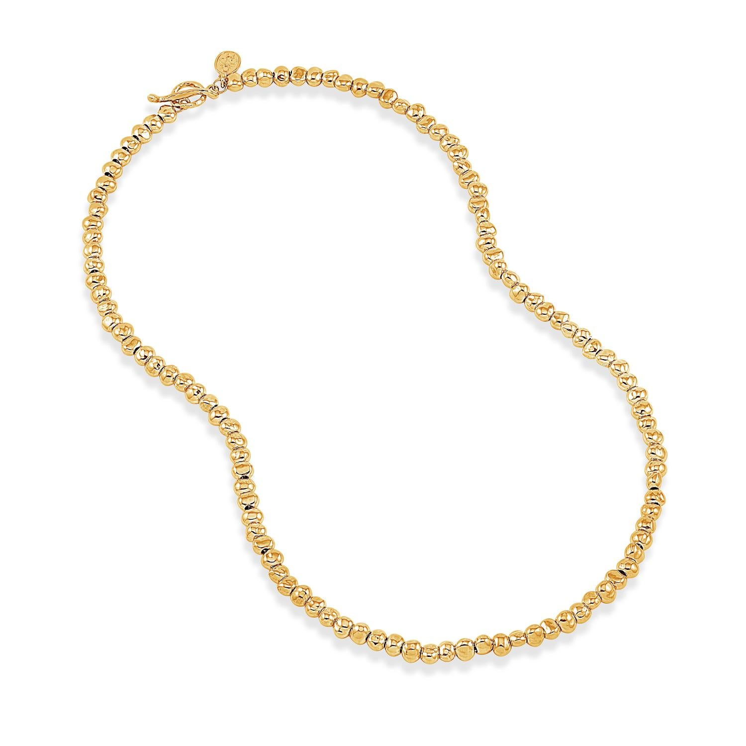 18ct yellow gold vermeil on a sterling silver necklace made of medium beaten nugget shaped beads threaded onto chain. The necklace is finished with our signature heart and t-bar clasp. A timeless classic.
Taking inspiration from various sources