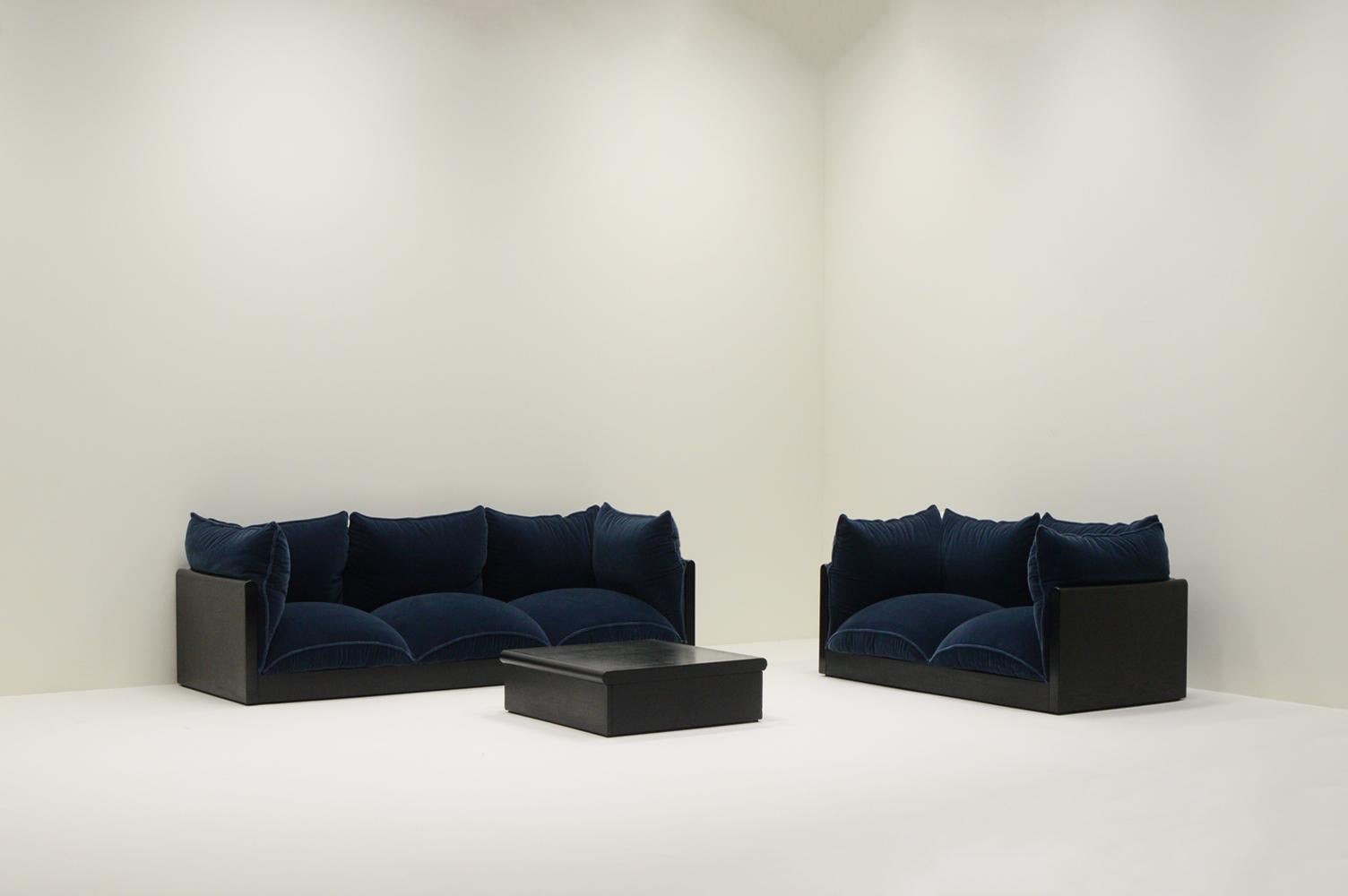 “Down” sofa set by Carlo Bartoli for Rossi di Albizzate, 1970s Italy. Part of the Down series this set consists of one 3-seater, one 2-seater and a coffee table. Satin black lacquered wood and reupholstered in a beautiful dark blue Mohair wool. As