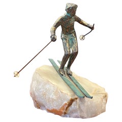 Escultura de bronce Esquiador alpino sobre base de ónice por C. Jere